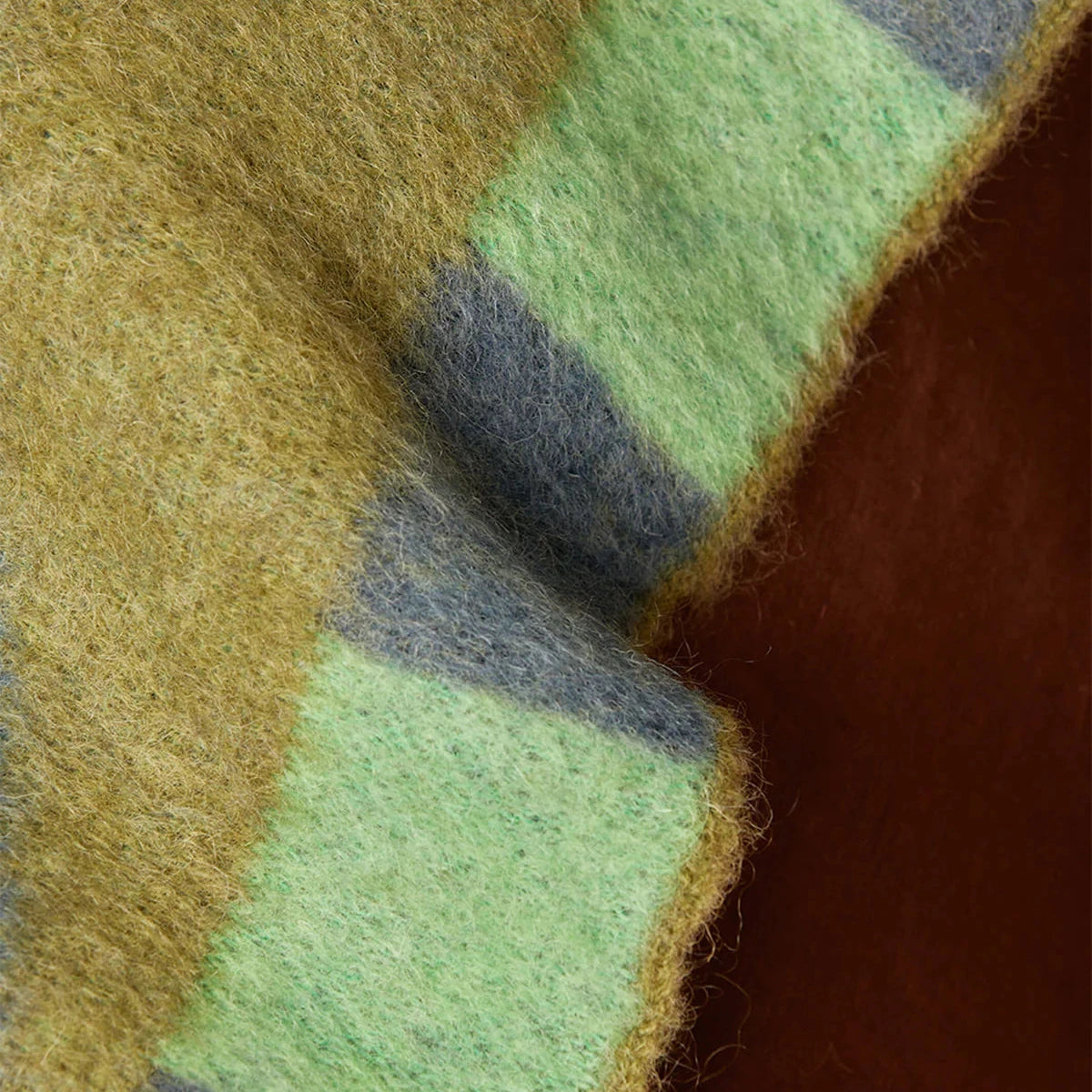 Wrap yourself in understated luxury with the Bonnie and Neil Geometric Pink Mohair Throw. Featuring a soft mohair blend and modern colour-block design, it's the perfect finishing touch for beds, sofas and cosy living spaces.