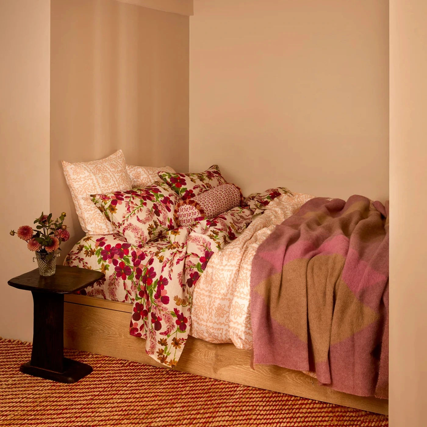 Wrap yourself in understated luxury with the Bonnie and Neil Geometric Pink Mohair Throw. Featuring a soft mohair blend and modern colour-block design, it's the perfect finishing touch for beds, sofas and cosy living spaces.