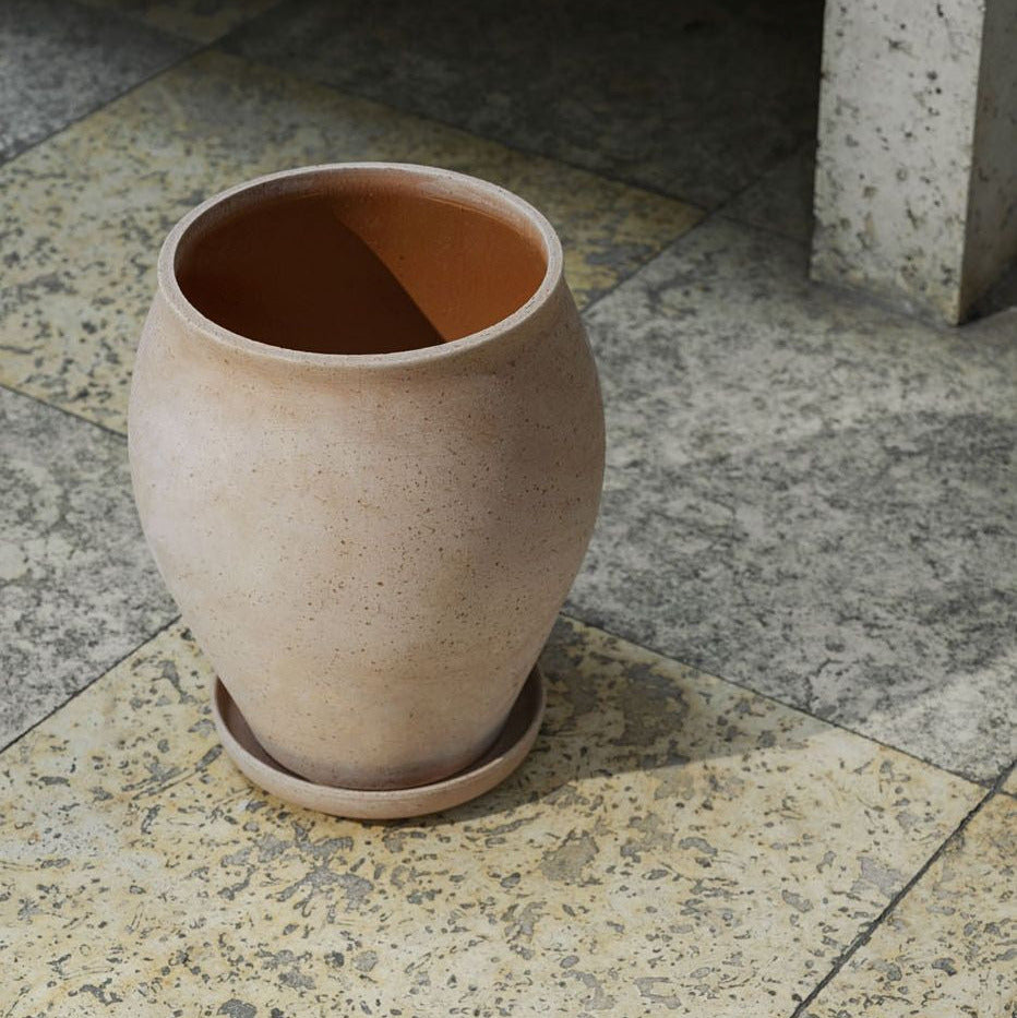 Bergs Potter Delphi Grey Tall terracotta planter with matching saucer in grey finish.