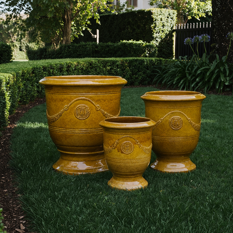 Grand Anduze urn in mustard glaze. A statement terracotta planter for formal gardens, courtyards and entryways.