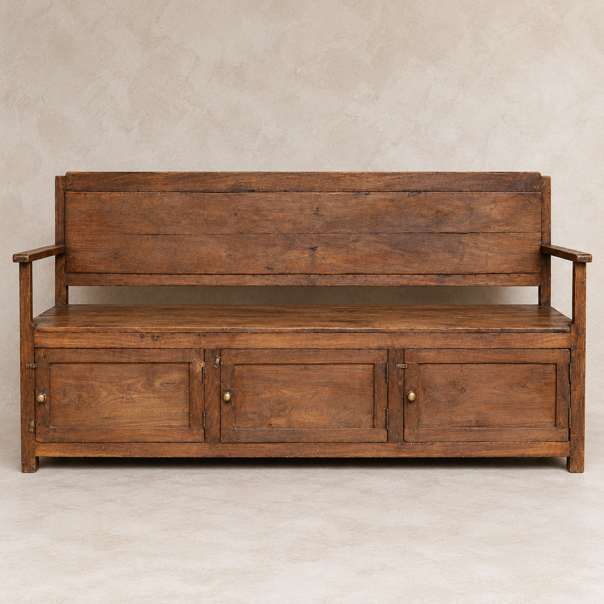 Vintage Indian wooden bench with three-door storage cupboard and naturally aged timber finish, exclusive to Brookfield Gardens Brisbane.