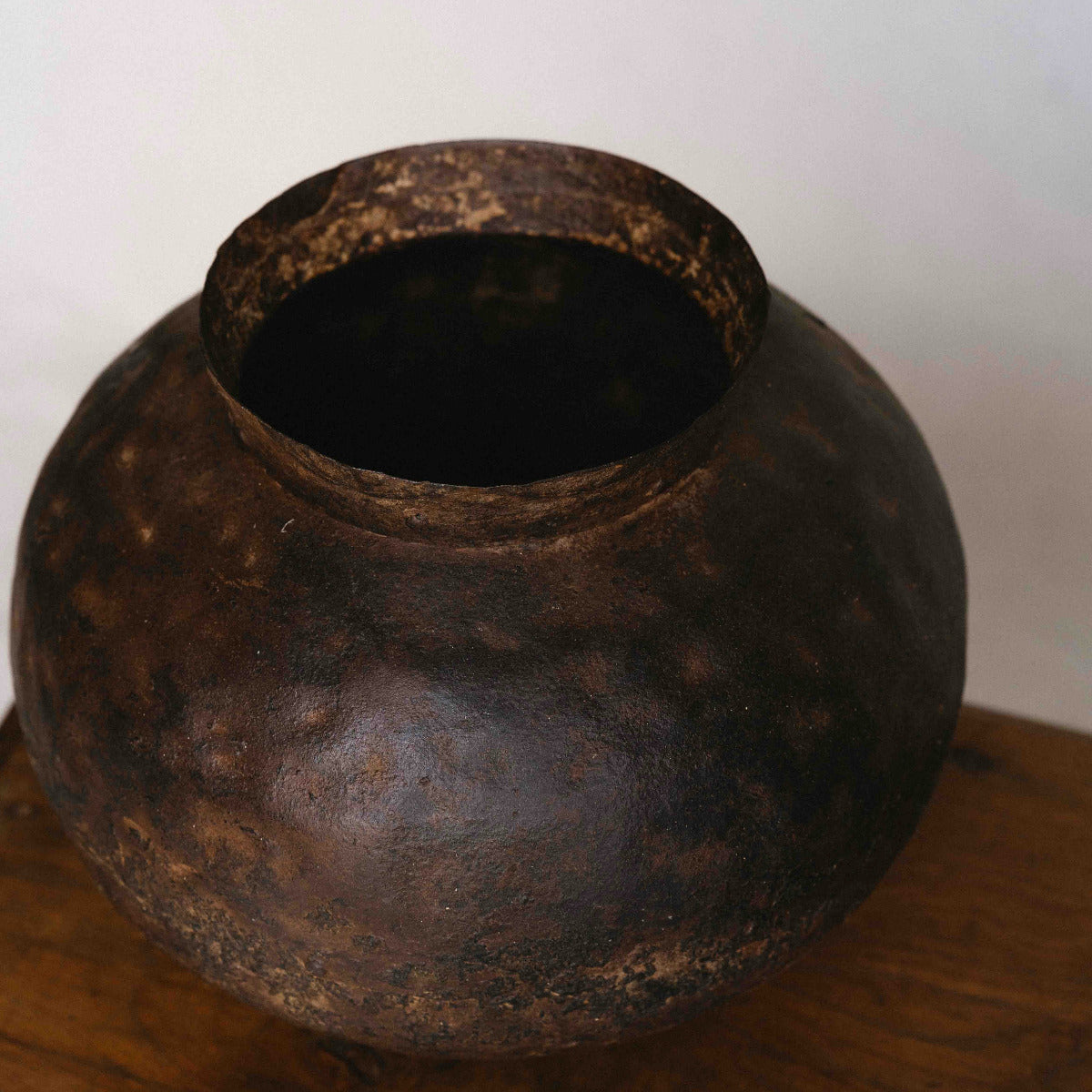 Vintage iron vessel from India, 30 x 25cm, with rounded form and rich aged patina, exclusive to Brookfield Gardens Brisbane.