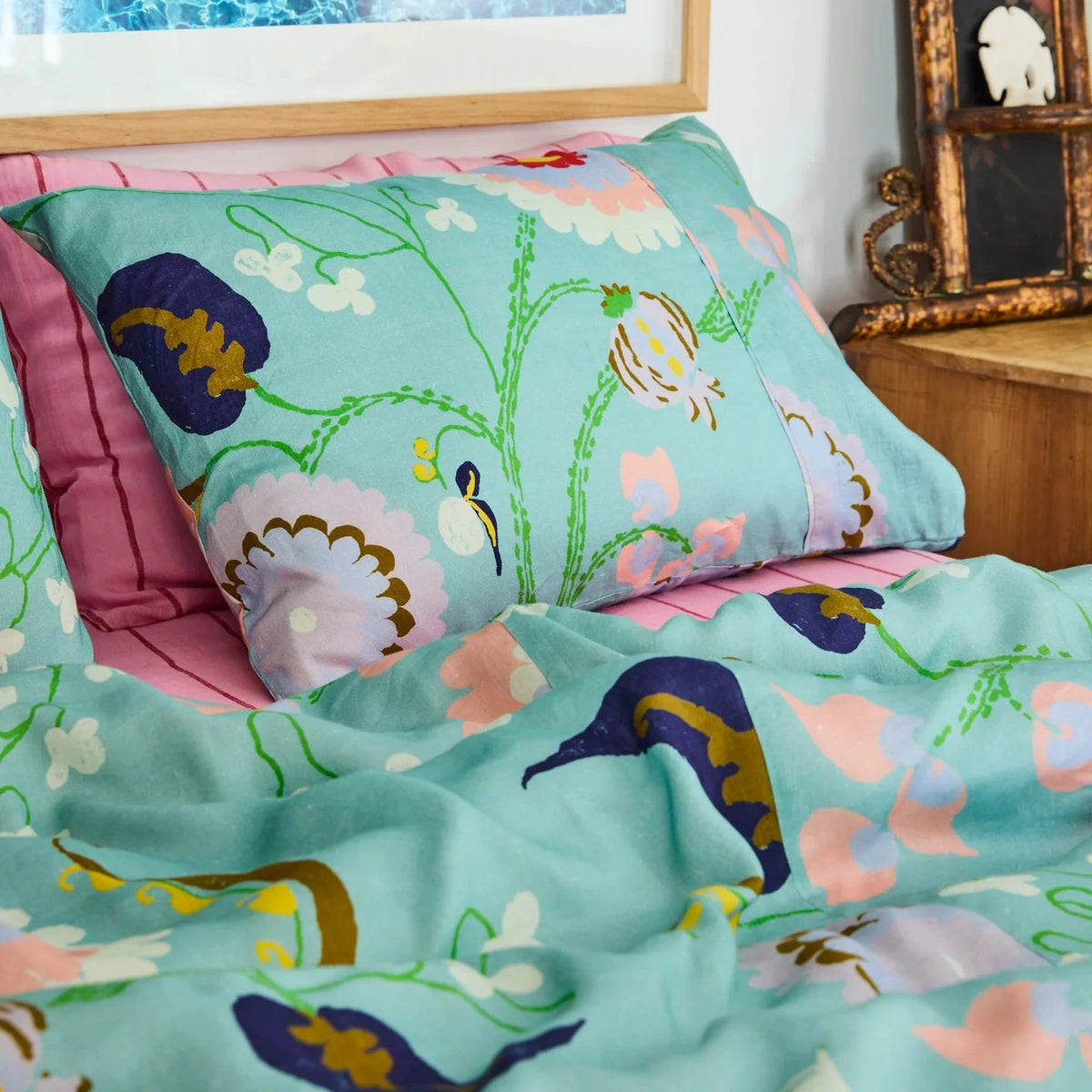 Kip & Co x Anna Spiro Isabelle Linen Pillowcases featuring a colourful floral print on soft French flax linen