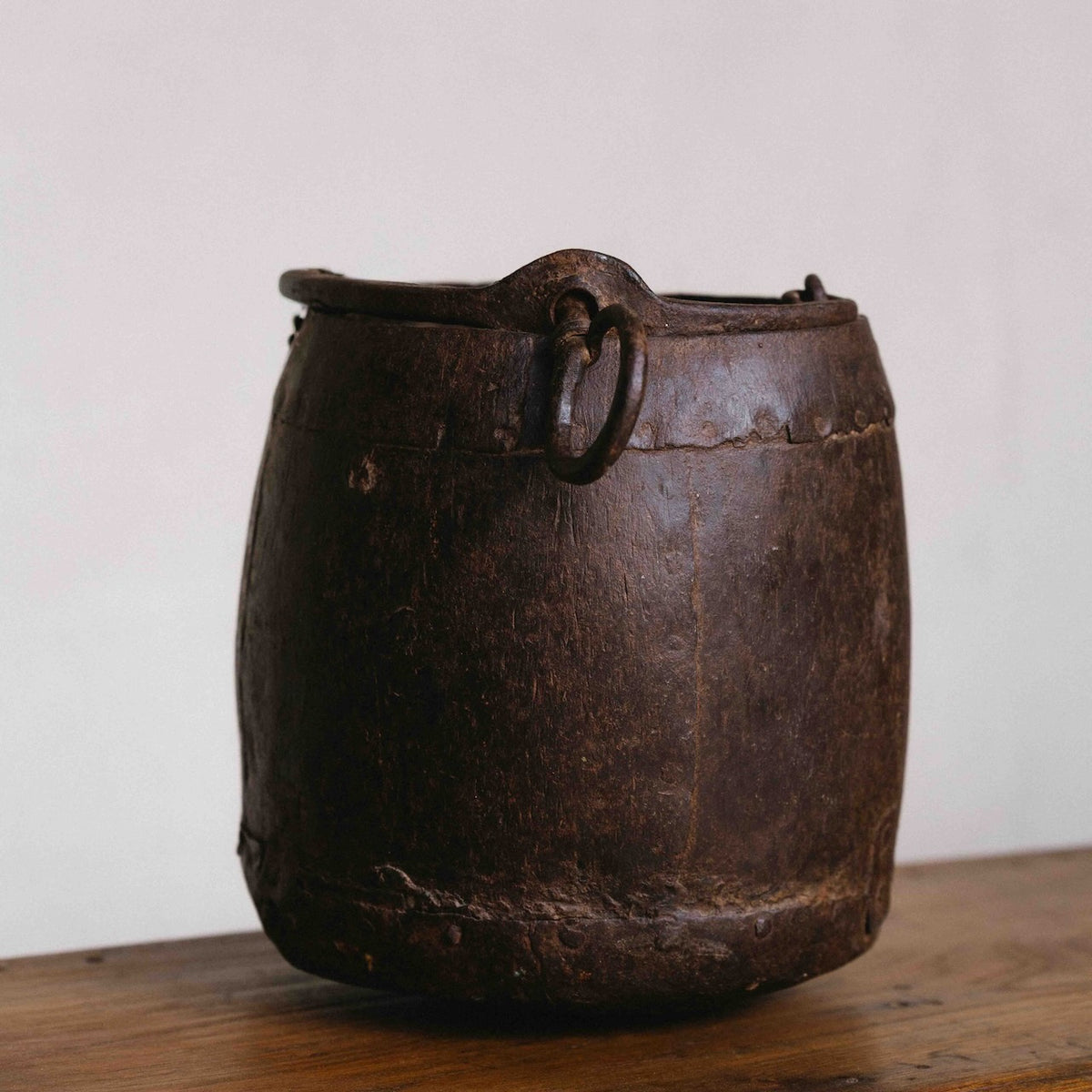 Vintage Indian iron planter with aged patina and ring handles, ideal for displaying orchids and indoor plants, exclusive to Brookfield Gardens.