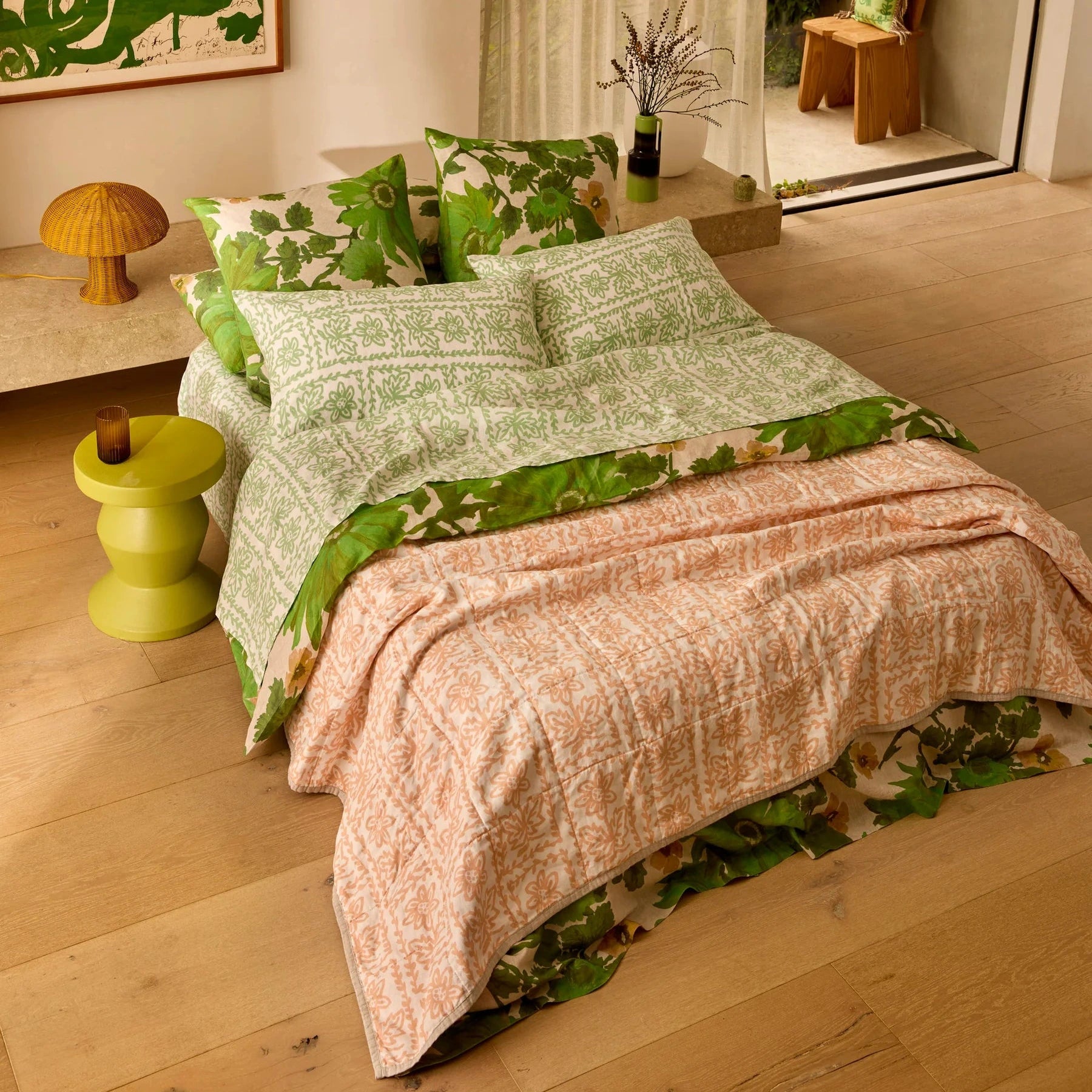 Bonnie and Neil Petal Pink & Daisy Buff linen quilted throw with reversible floral prints in soft pink and warm buff tones, crafted from stonewashed French flax linen.