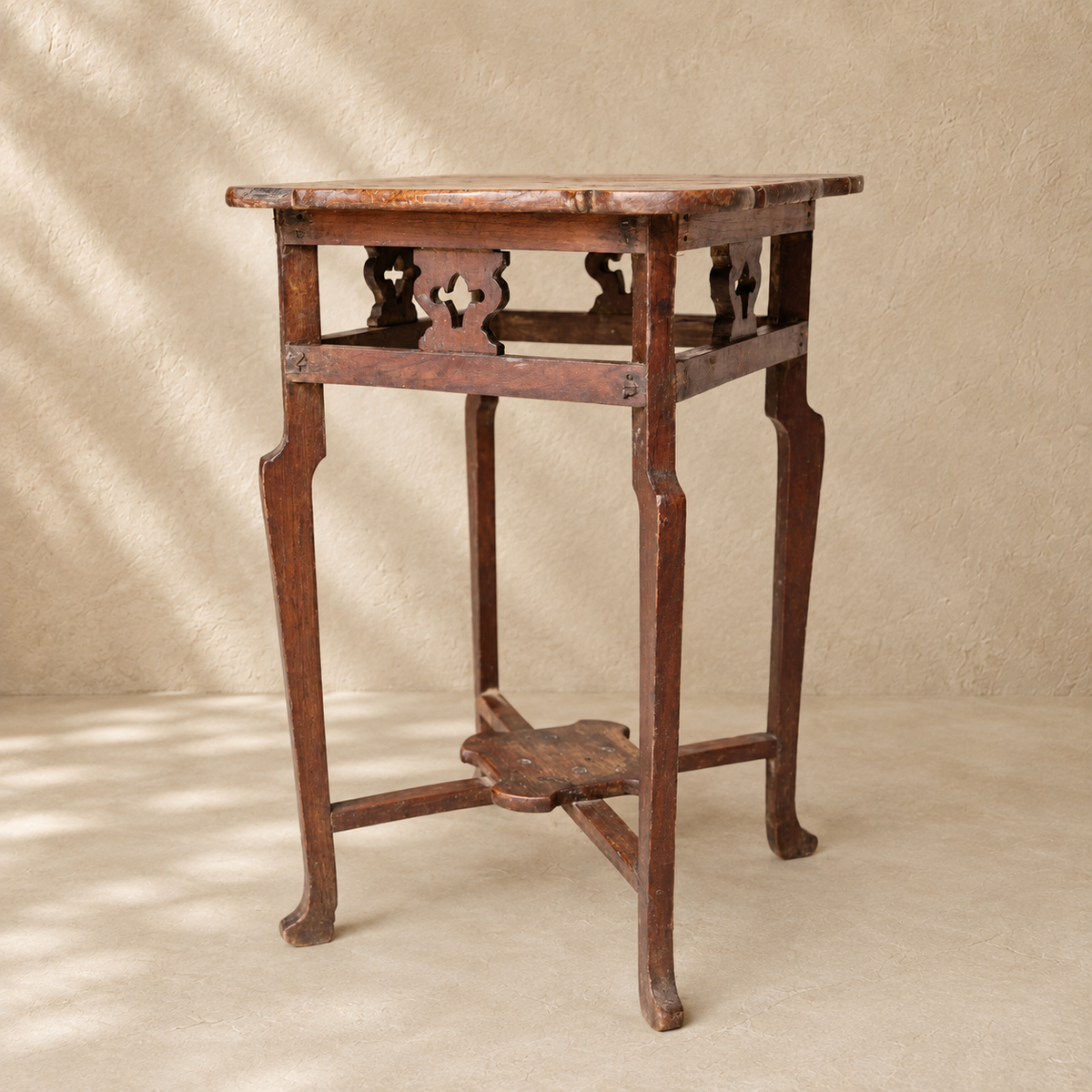 Vintage Indian small wooden side table with decorative cut-out details, ideal for orchids and home display, exclusive to Brookfield Gardens.