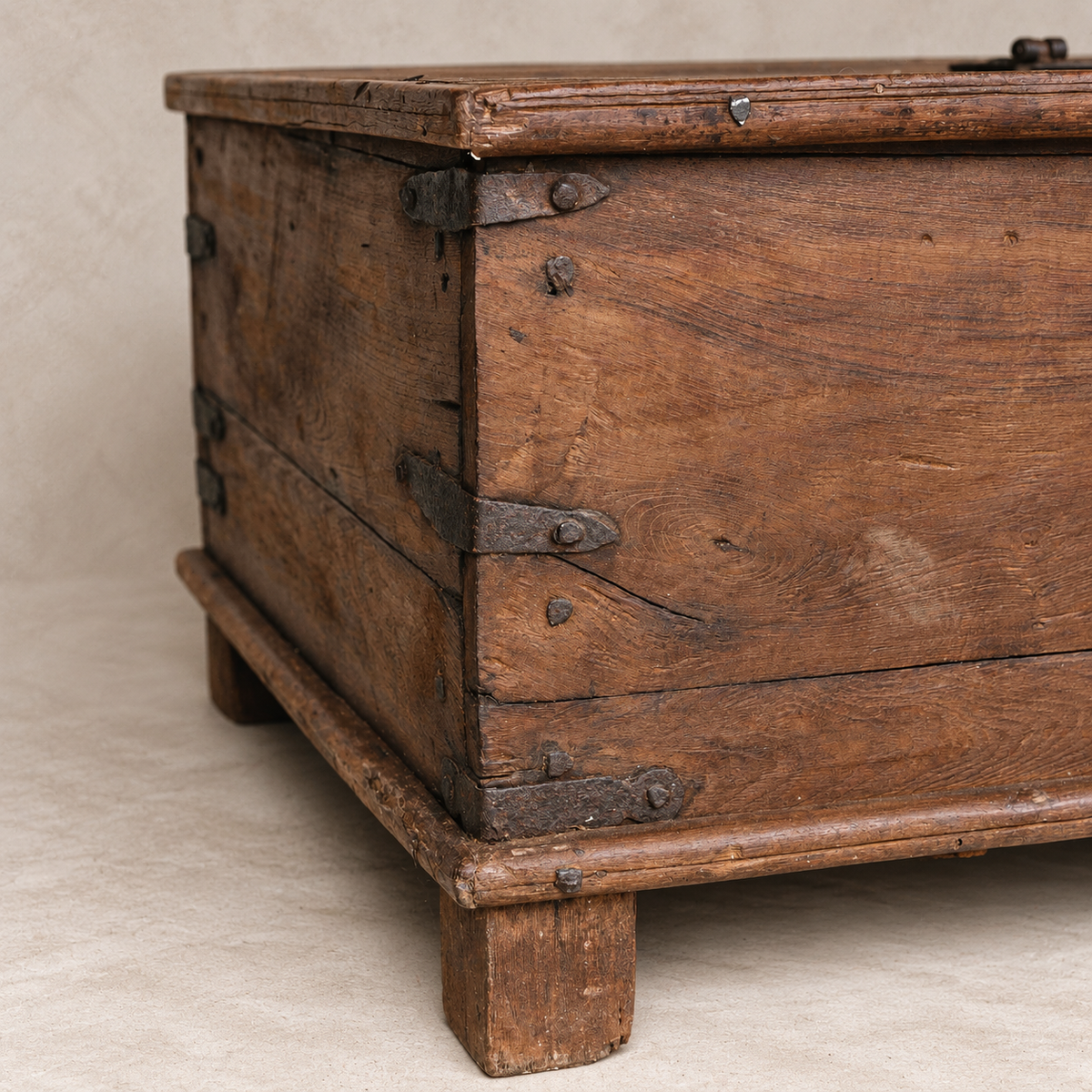 Vintage Indian wooden coffee table with lock, carved floral detail, iron hardware and hidden storage, exclusive to Brookfield Gardens Brisbane.