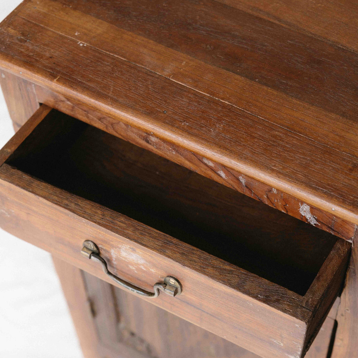 Vintage wooden bedside table from India with one drawer, cupboard and carved timber door, sold separately, exclusive to Brookfield Gardens Brisbane.