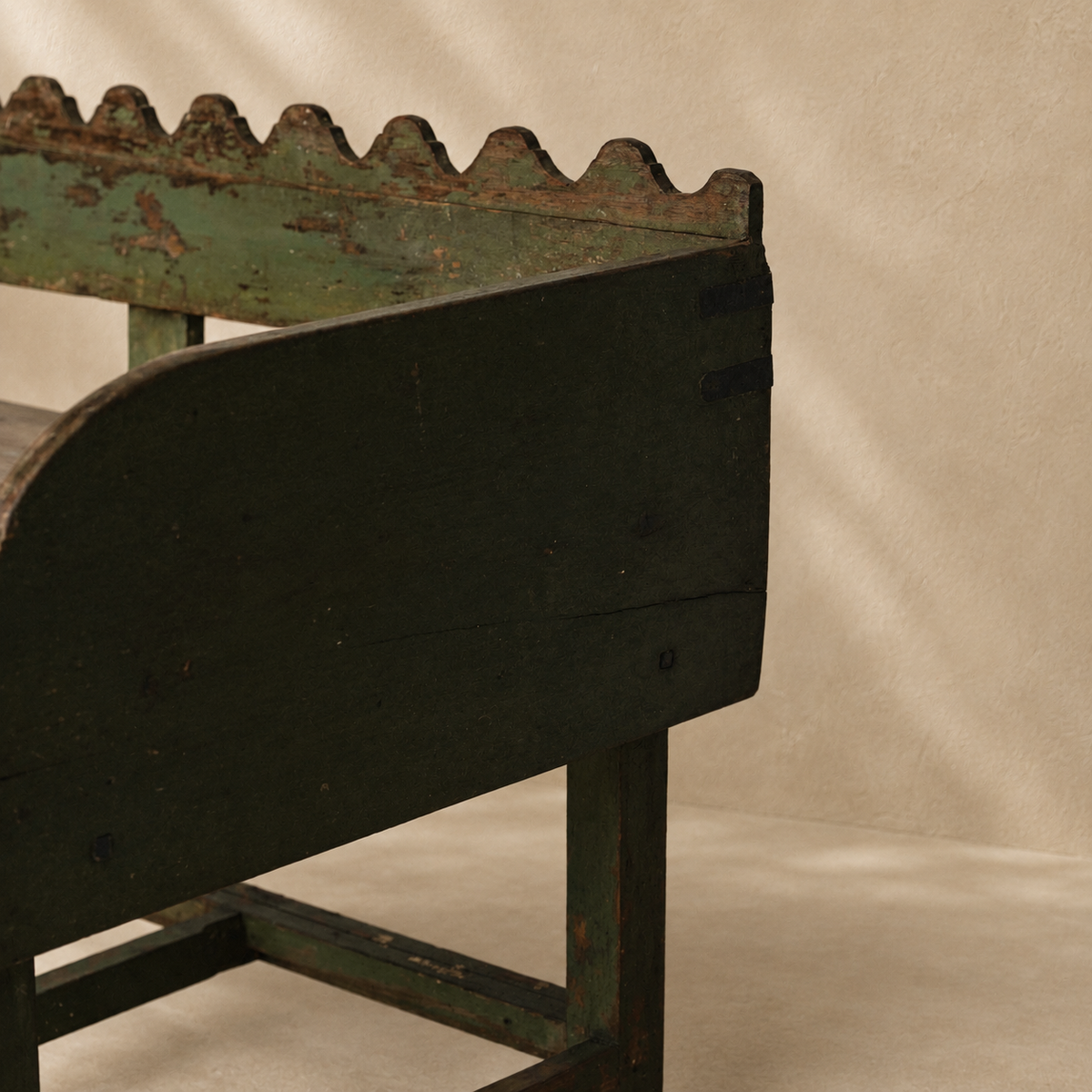 Vintage Indian wooden wave bench with scalloped back, original green paint and aged timber patina, exclusive to Brookfield Gardens.