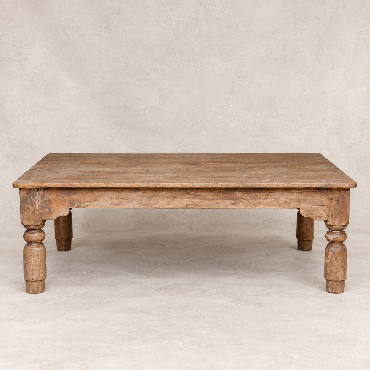 Large vintage wooden coffee table from India with turned legs and aged natural timber, ideal for living rooms and relaxed home interiors, exclusive to Brookfield Gardens.