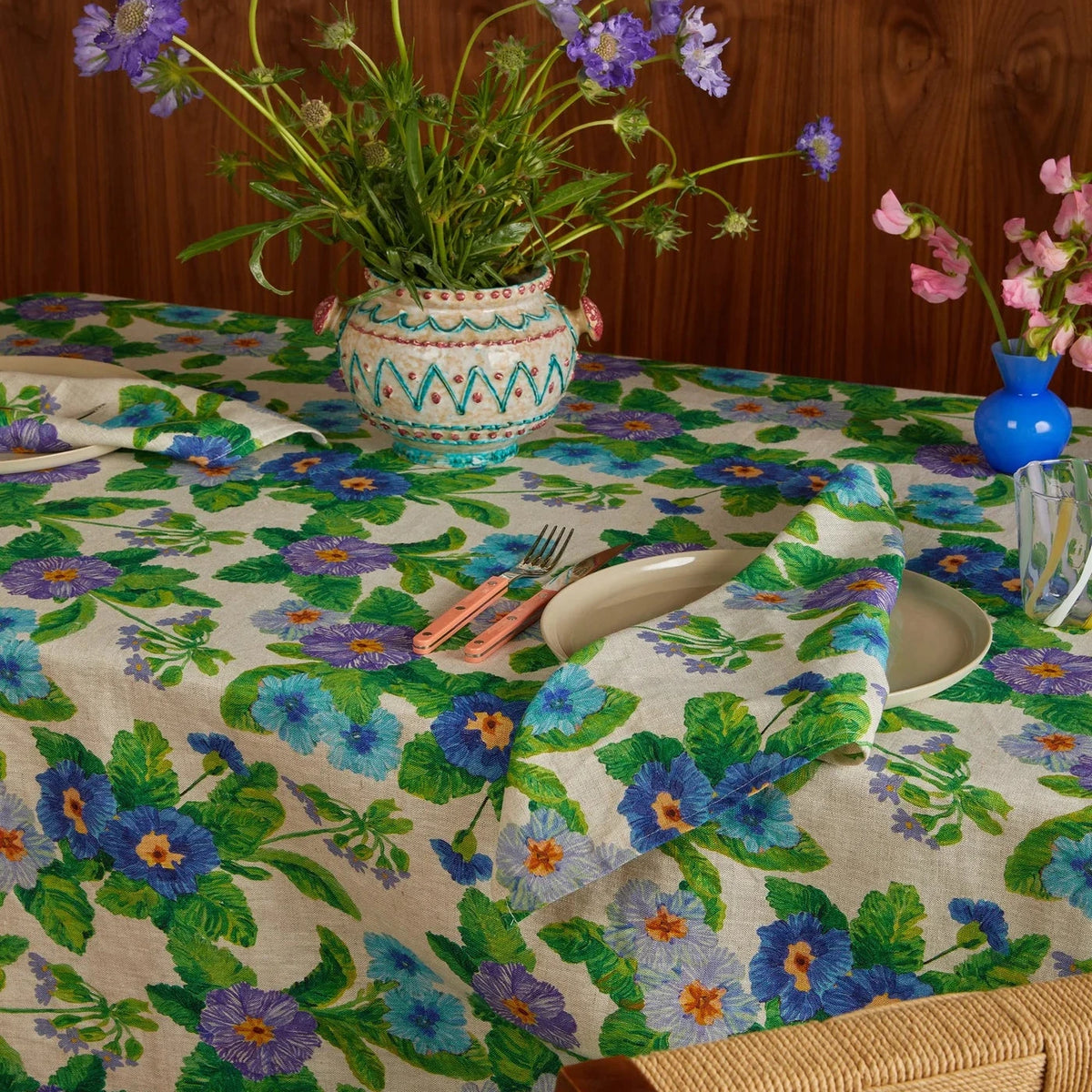 Bonnie & Neil Summer Patch Blue Linen Tablecloth with hand-drawn summer floral and foliage design on oat French flax linen