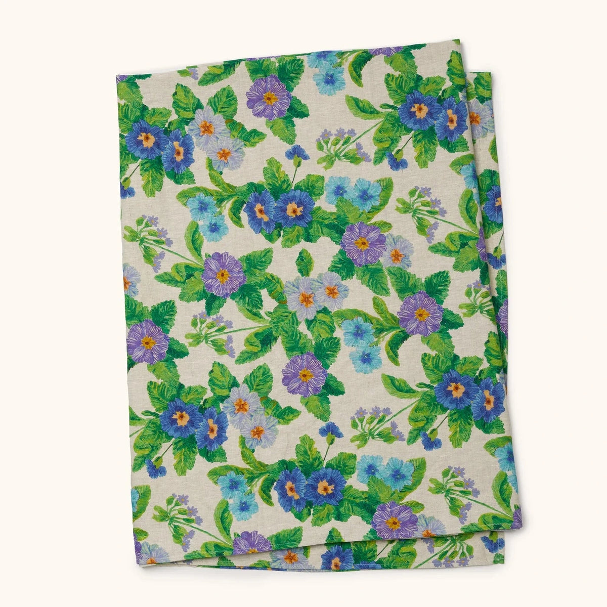 Bonnie & Neil Summer Patch Blue Linen Tablecloth with hand-drawn summer floral and foliage design on oat French flax linen