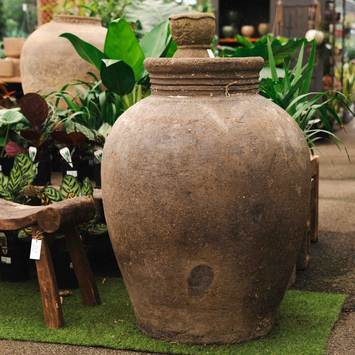 Large vintage Indian terracotta urn with rim neck and aged earthy patina.