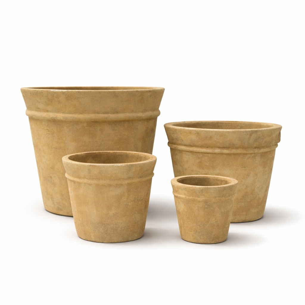 Antique Terra Desio terracotta planters in multiple sizes with aged patina and classic rolled rim.