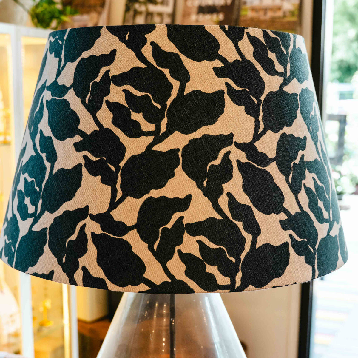 Lamp with a patterned shade on a table