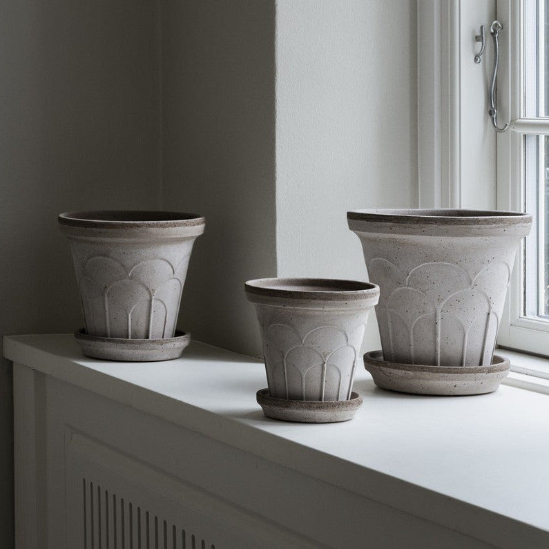 Bergs Potter Fleur grey terracotta pot with embossed floral relief and matching saucer