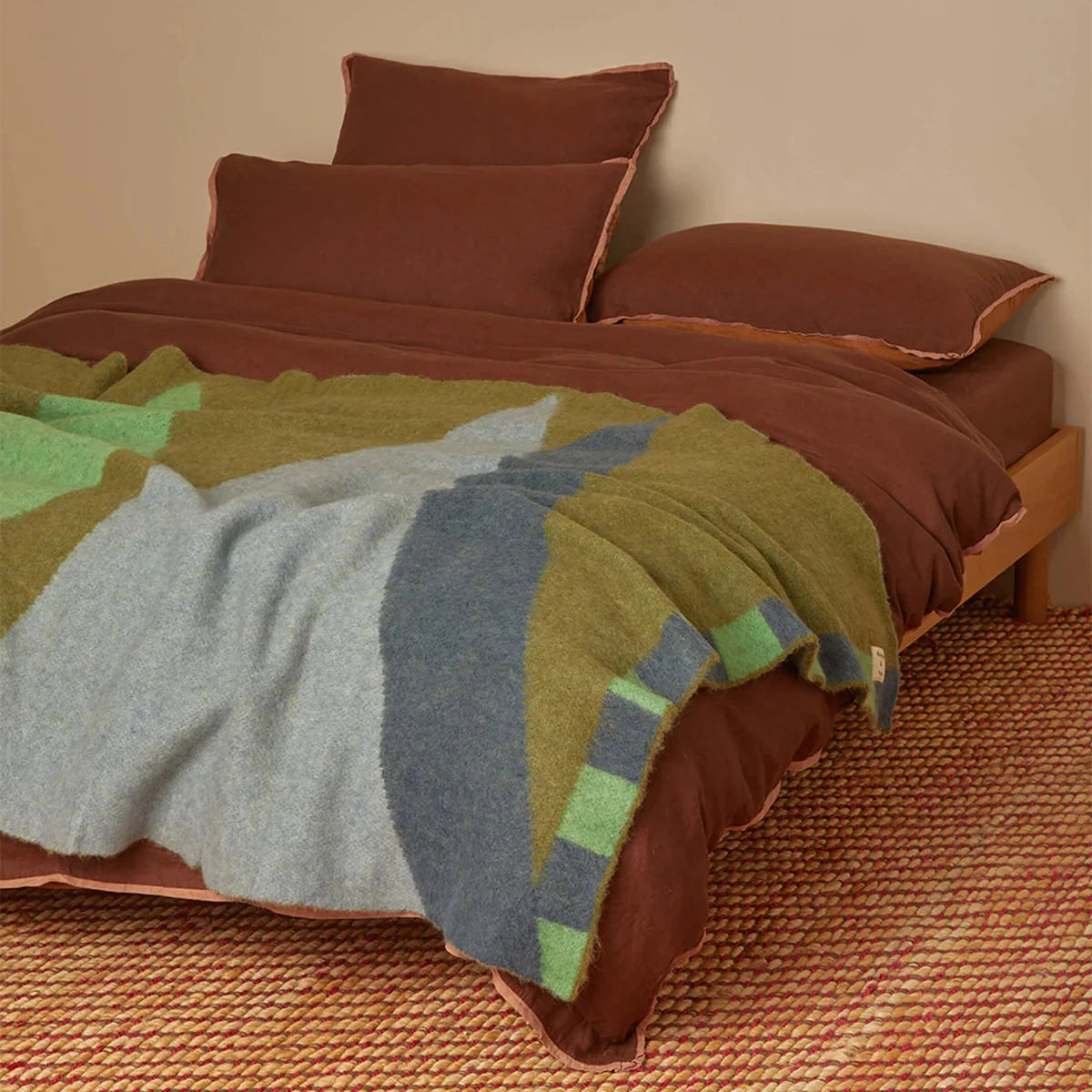 Wrap yourself in understated luxury with the Bonnie and Neil Geometric Pink Mohair Throw. Featuring a soft mohair blend and modern colour-block design, it's the perfect finishing touch for beds, sofas and cosy living spaces.