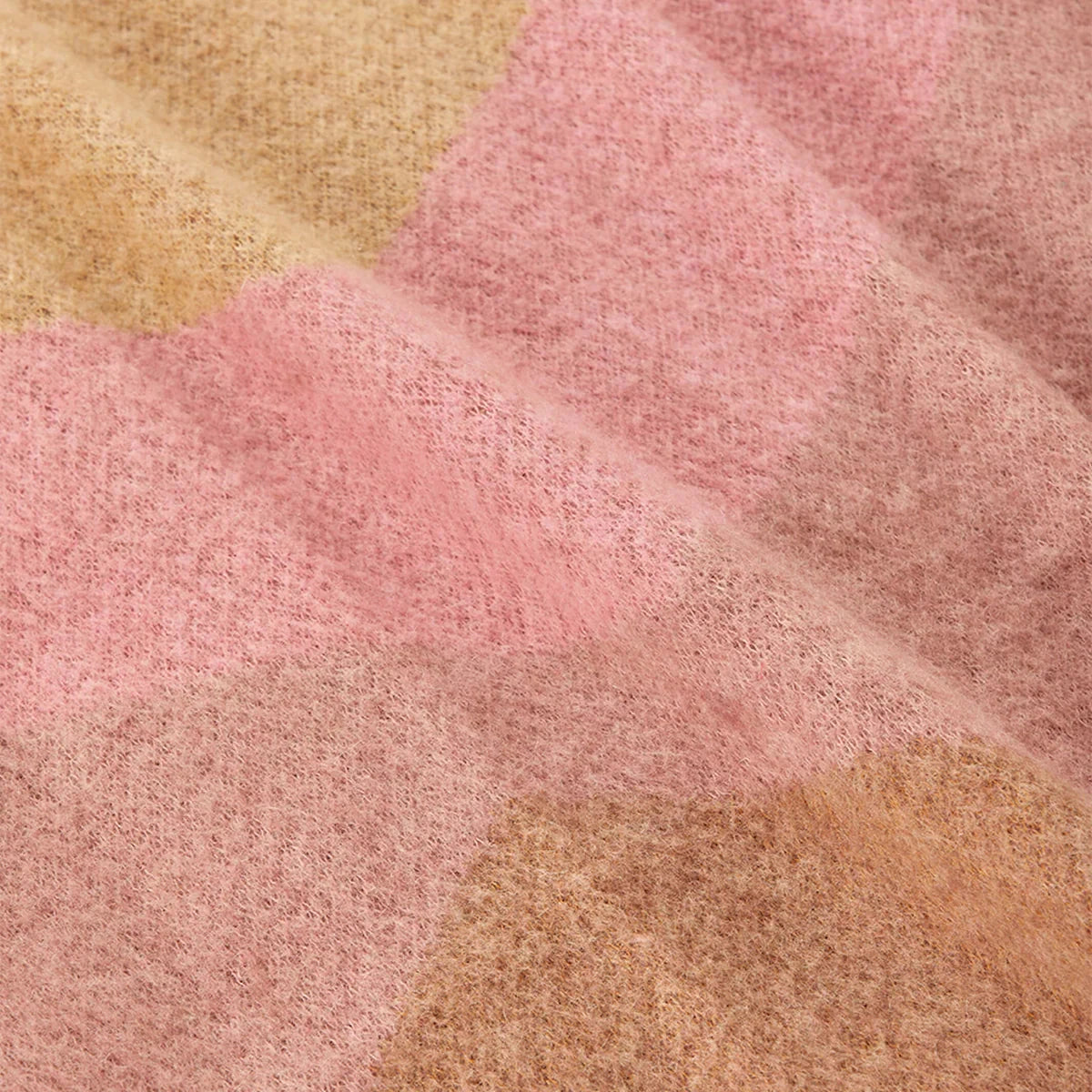 Wrap yourself in understated luxury with the Bonnie and Neil Geometric Pink Mohair Throw. Featuring a soft mohair blend and modern colour-block design, it's the perfect finishing touch for beds, sofas and cosy living spaces.