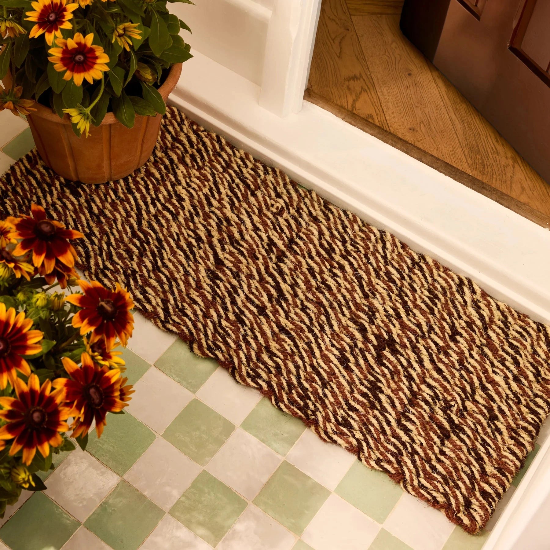 Bonnie and Neil Brown Jute Door Mat made from sturdy woven jute rope in warm natural brown tones.