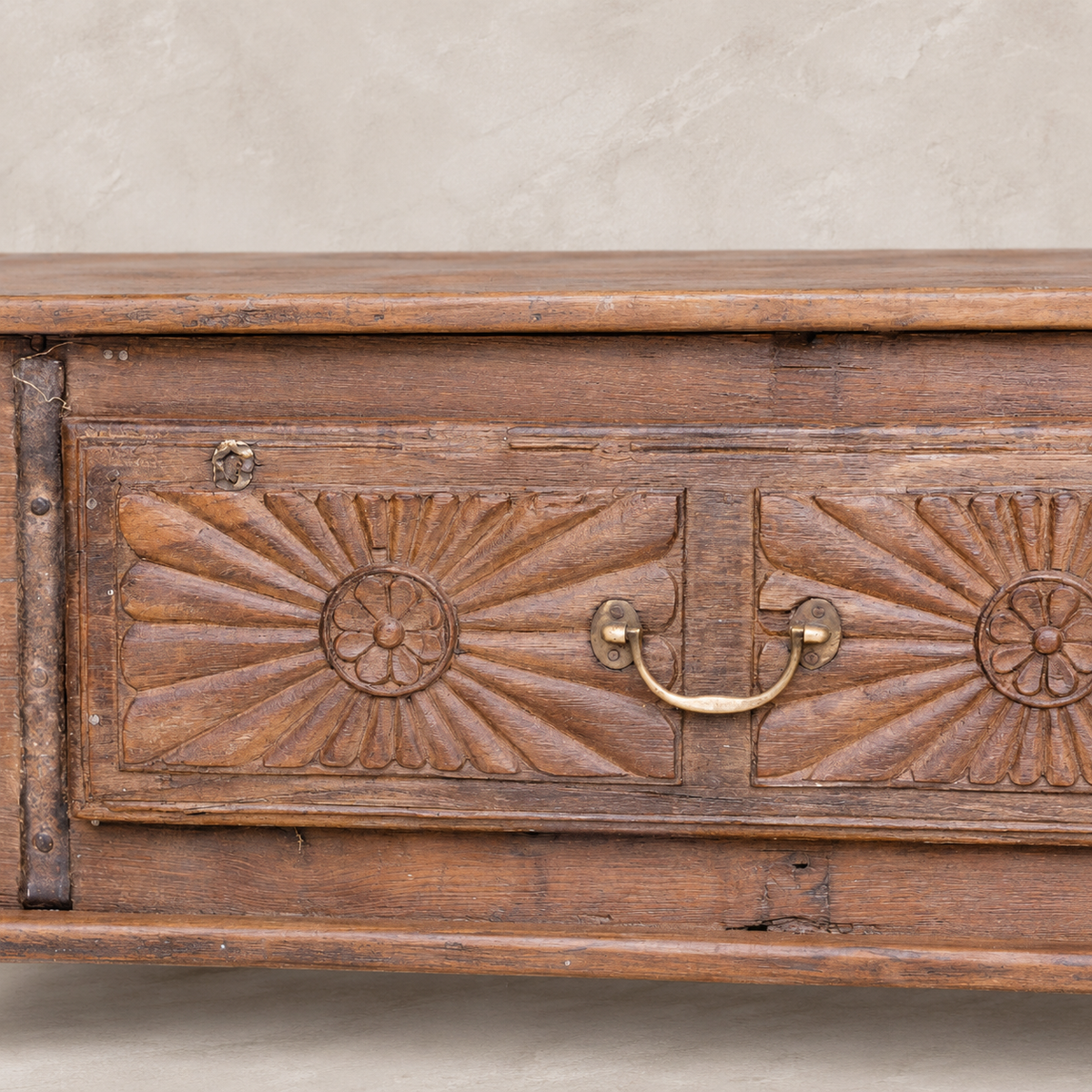 Vintage carved wooden coffee table from India with floral sunburst detailing and aged timber, 106 × 57 × 45cm, exclusive to Brookfield Gardens.