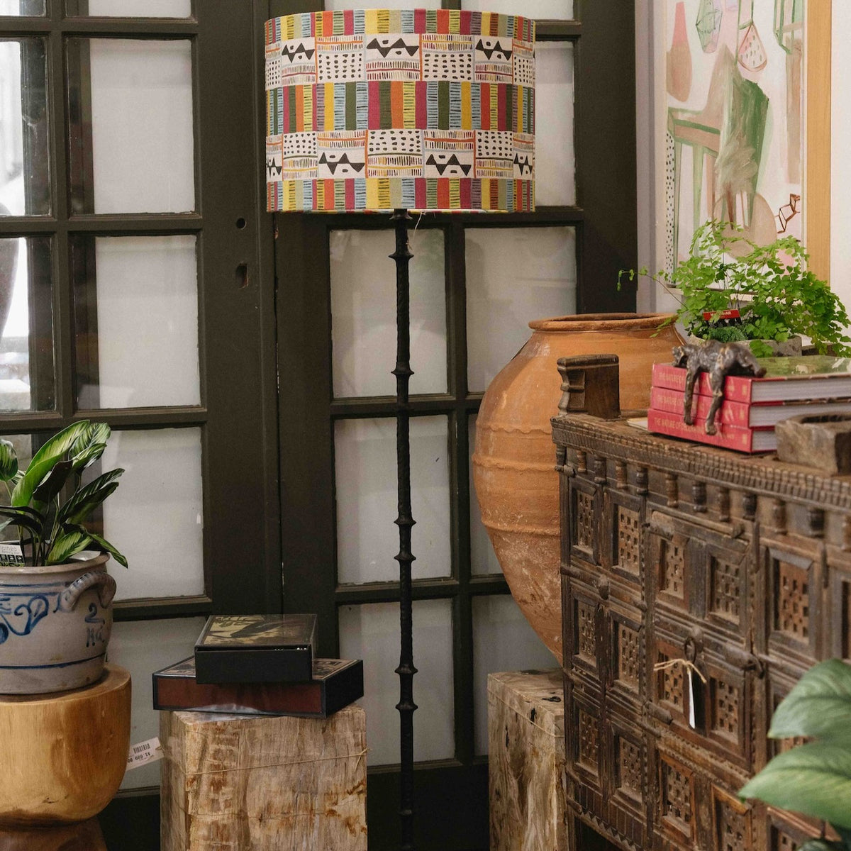 Custom silver floor lamp with colourful Anna Spiro Midhurst shade styled in an eclectic home interior at Brookfield Gardens.