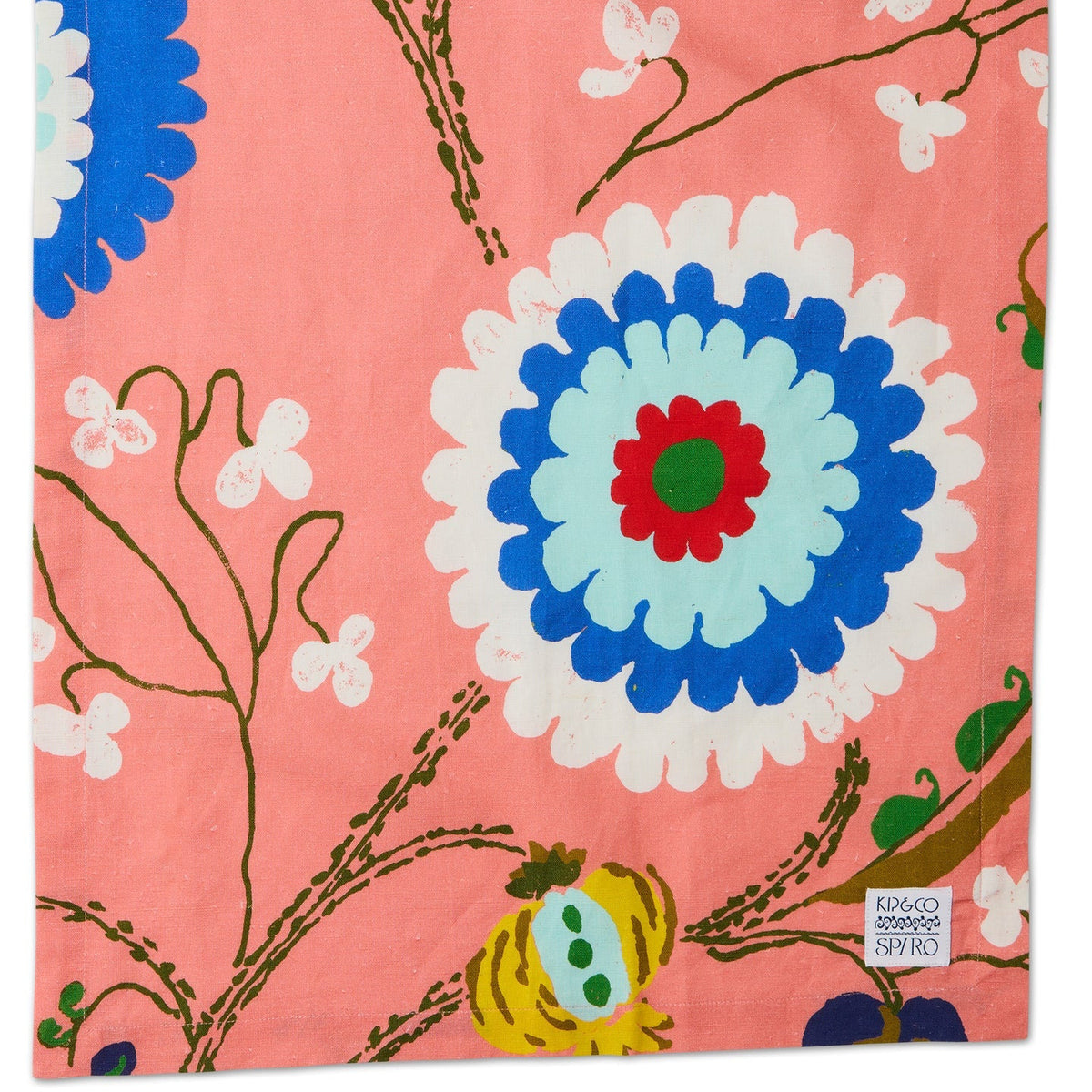 Kip & Co x Anna Spiro Isabelle Sunset Tea Towel featuring oversized blue, aqua, white and yellow florals on a coral pink background.