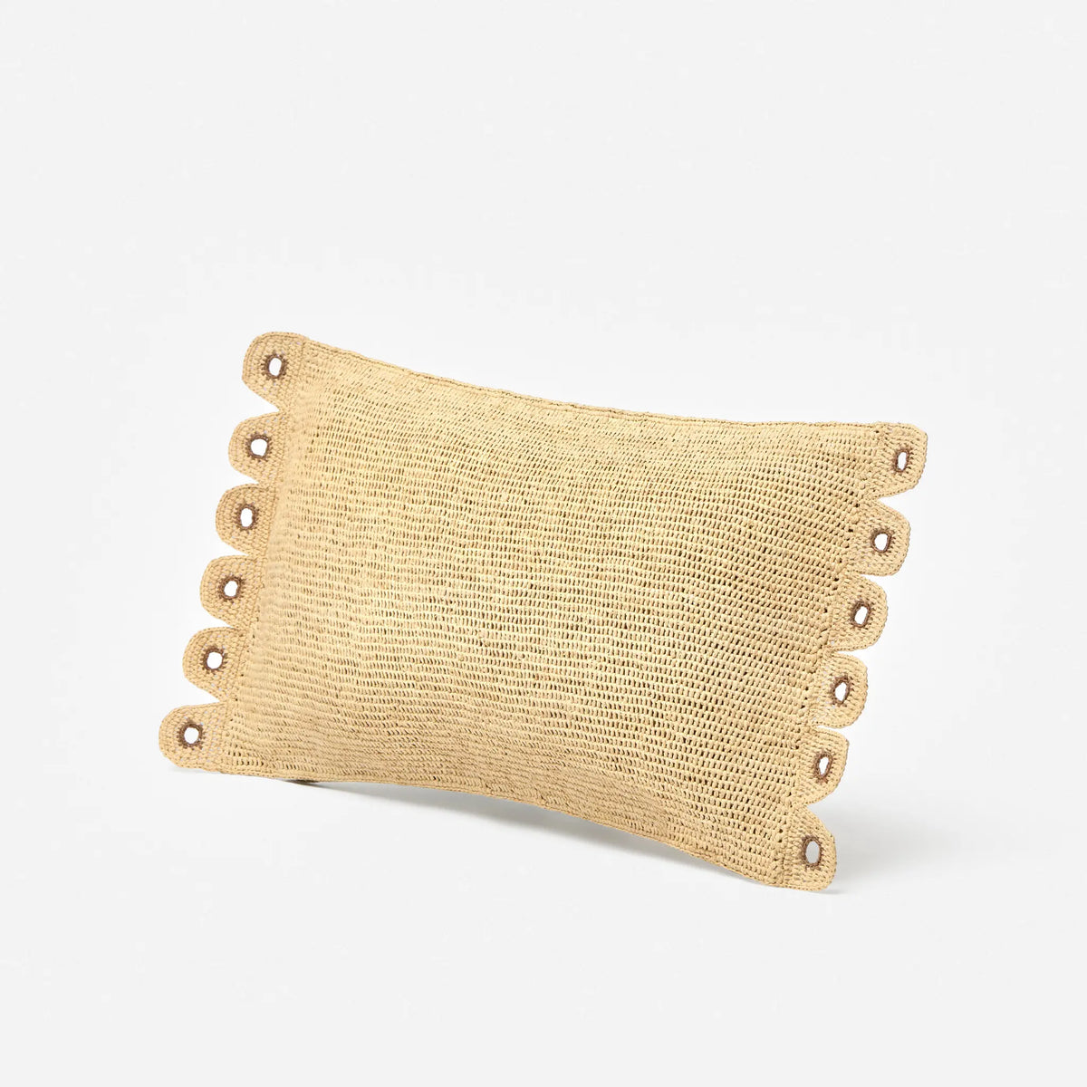 Tanora Lavaka Cushion 50 x 30cm, handwoven from natural raffia with decorative scalloped edges, available at Brookfield Gardens.
