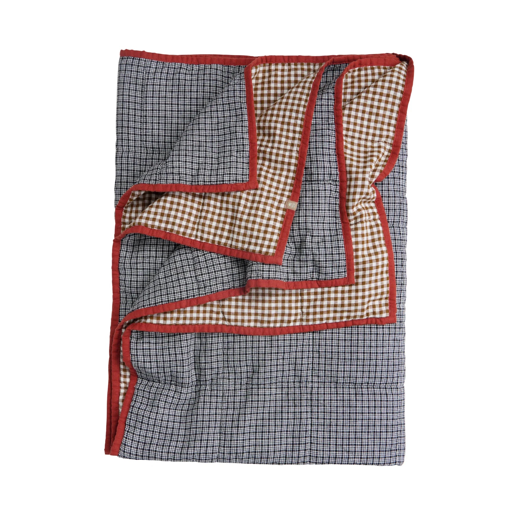 Checkered blanket with red border on a white background