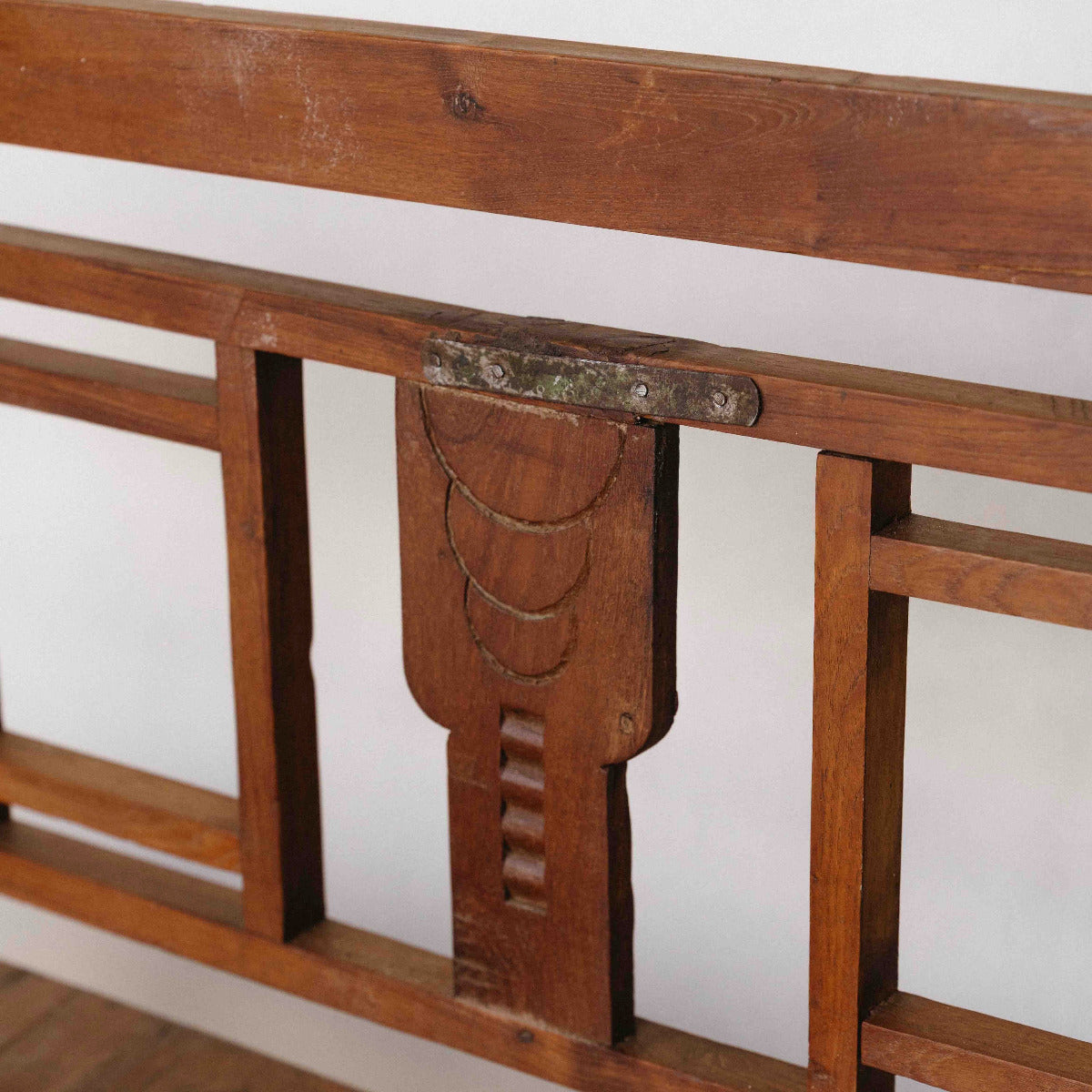 One-of-a-kind vintage Indian wooden bench with square geometric back, carved detailing and beautifully aged timber, exclusive to Brookfield Gardens.