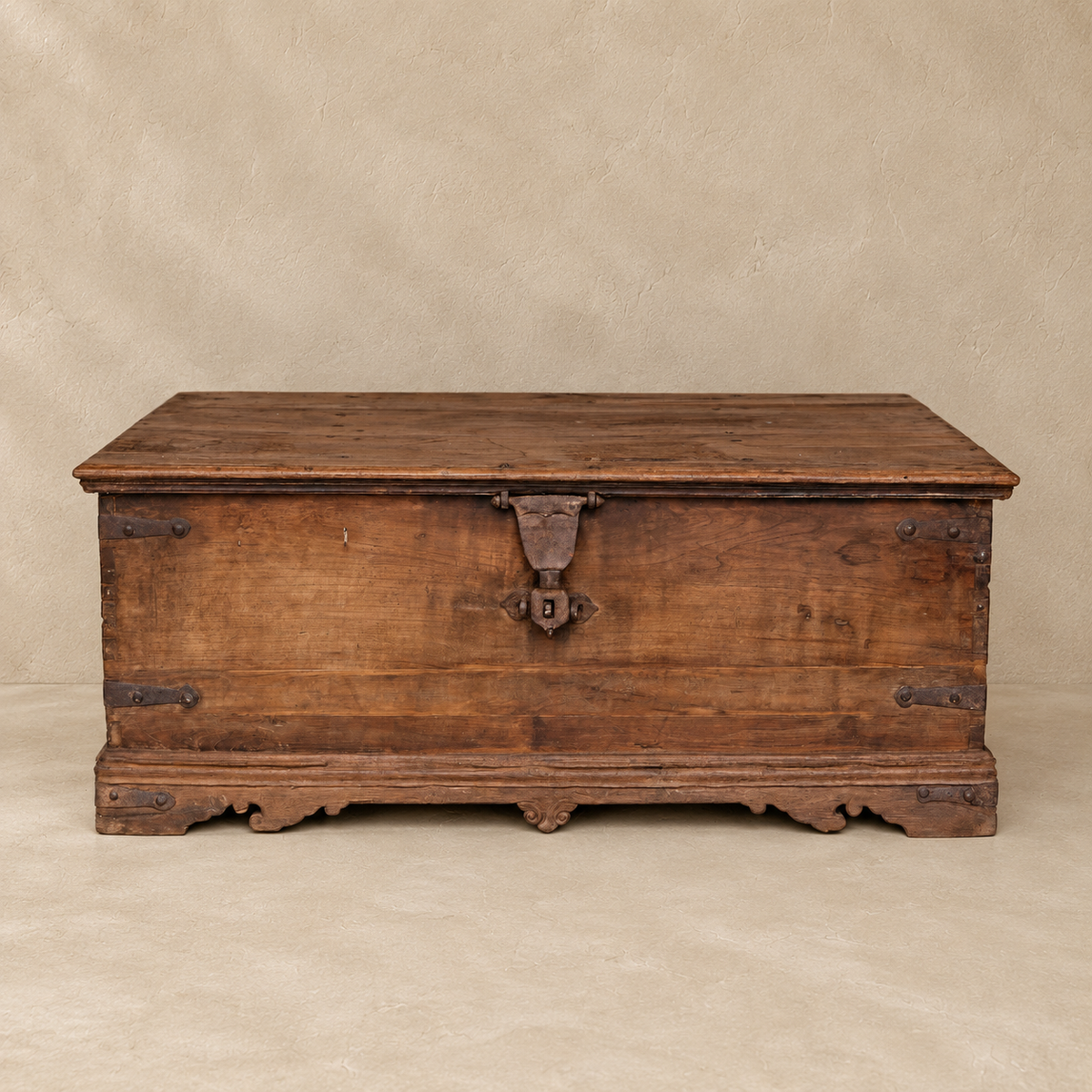 Vintage Indian wooden coffee table with lift-up lid, iron hardware and hidden storage, exclusive to Brookfield Gardens Brisbane.