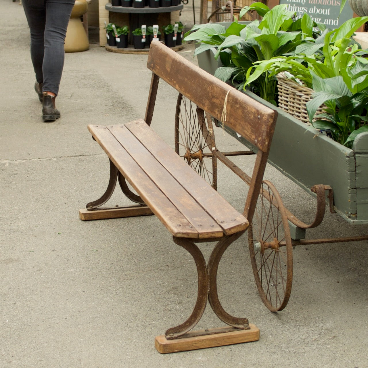Vintage Wooden Iron Bench with weathered timber seat and aged iron frame, ideal for traditional gardens, courtyards and outdoor entertaining spaces.