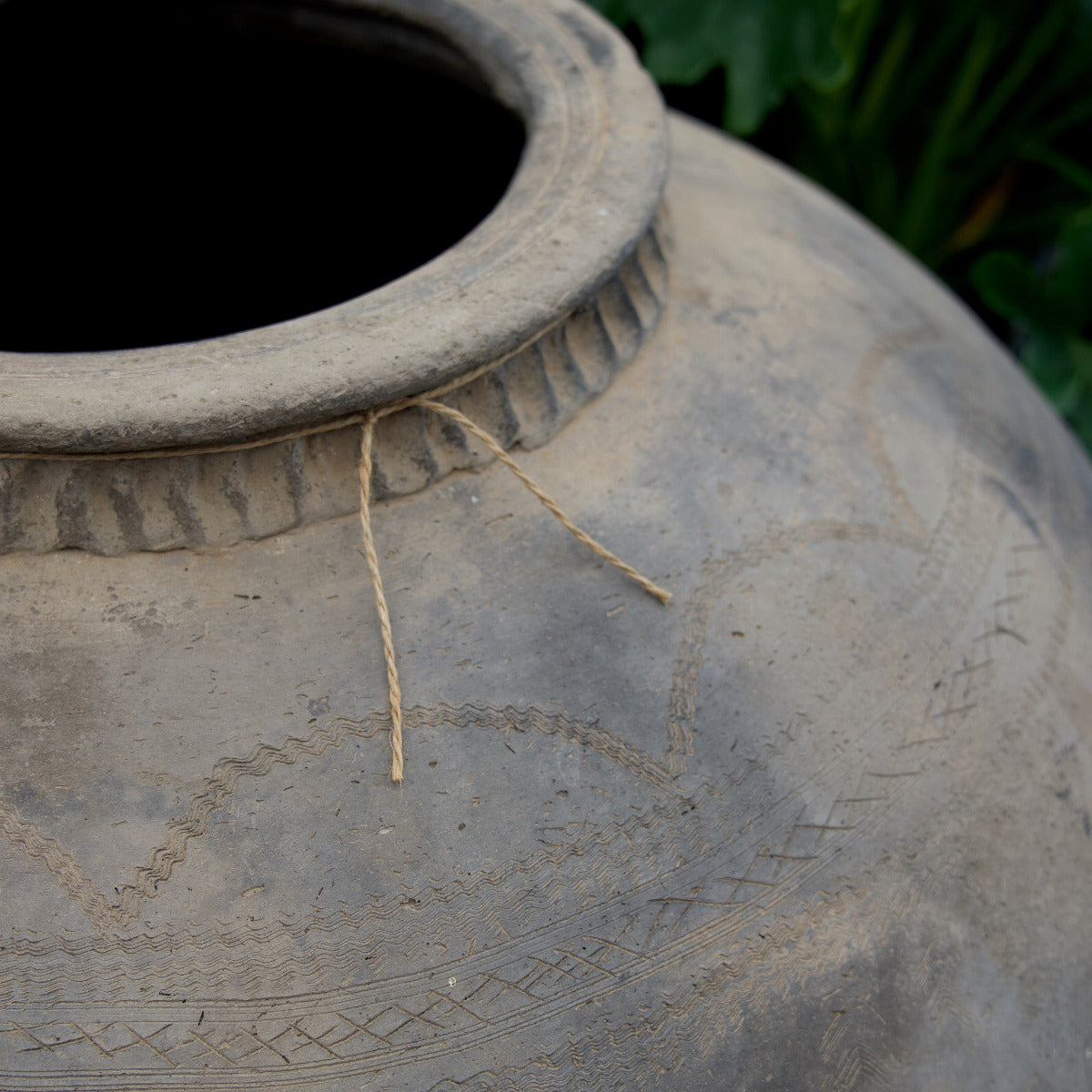 Large vintage Indian terracotta urn with rounded form, decorative rim and naturally weathered earthy finish, exclusive to Brookfield Gardens.