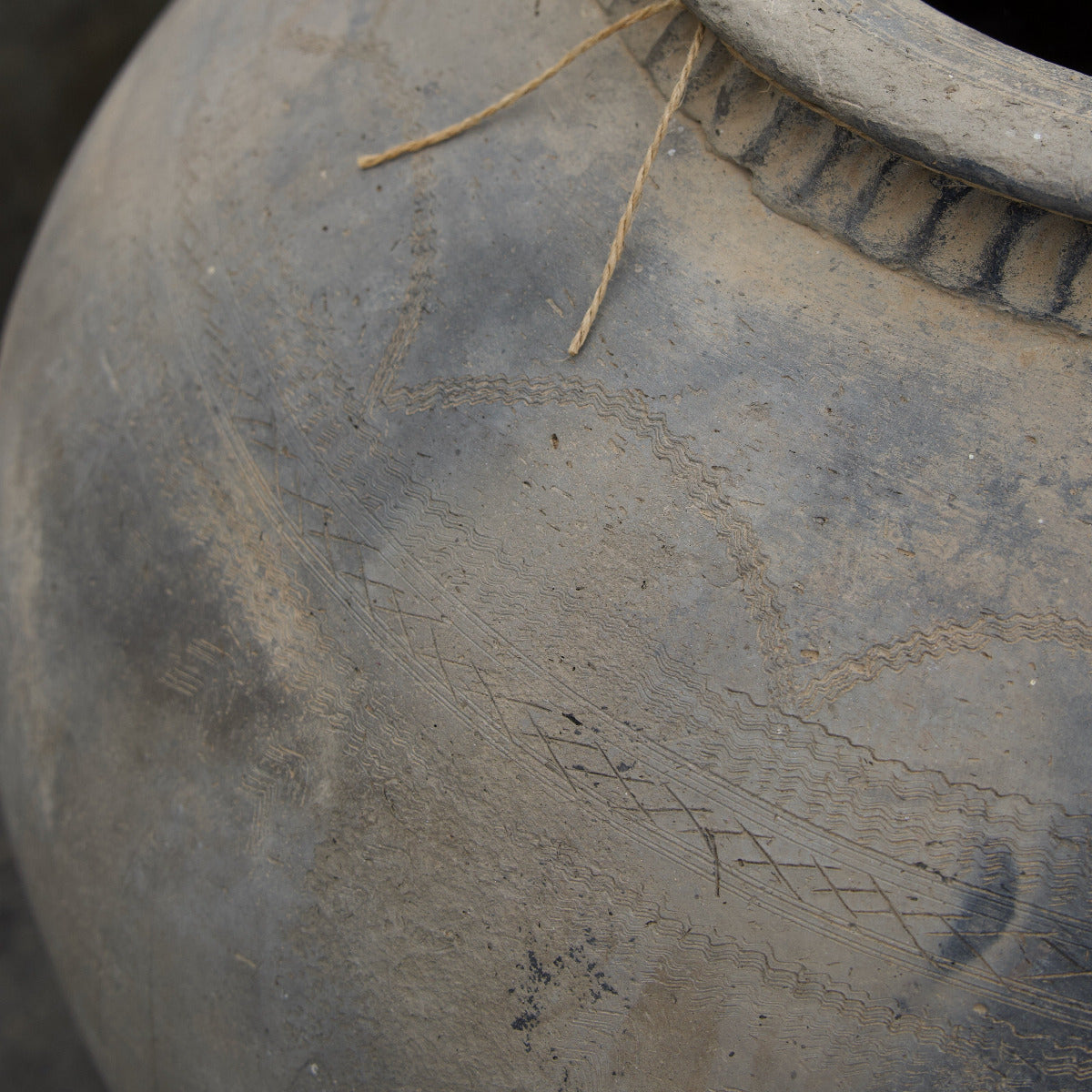 Large vintage Indian terracotta urn with rounded form, decorative rim and naturally weathered earthy finish, exclusive to Brookfield Gardens.