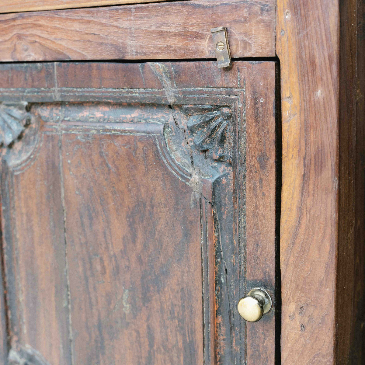 Vintage wooden bedside table from India with one drawer, cupboard and carved timber door, sold separately, exclusive to Brookfield Gardens Brisbane.