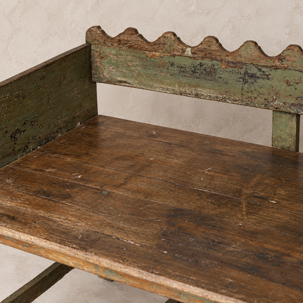 Vintage Indian wooden wave bench with scalloped back, original green paint and aged timber patina, exclusive to Brookfield Gardens.