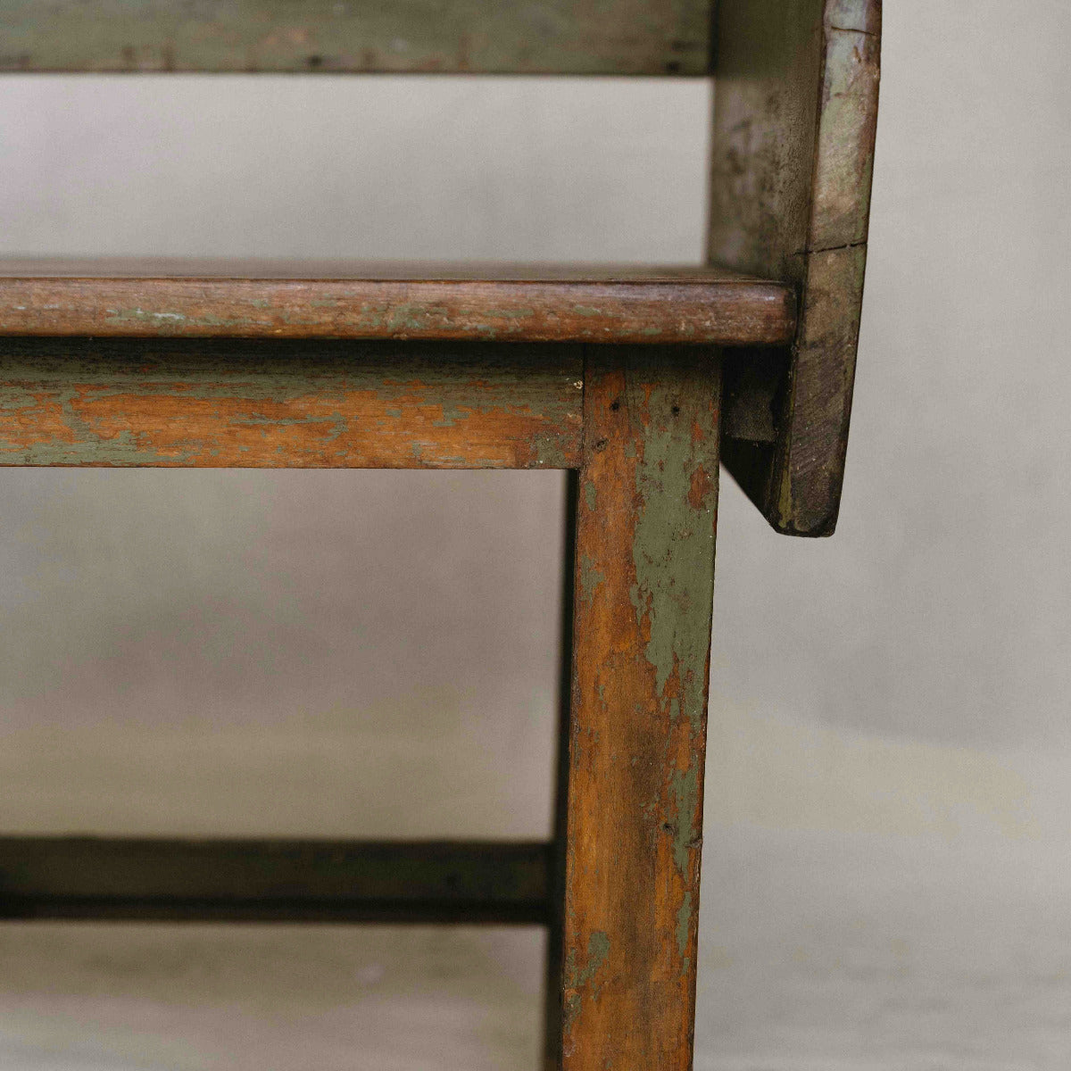 Vintage Indian wooden wave bench with scalloped back, original green paint and aged timber patina, exclusive to Brookfield Gardens.
