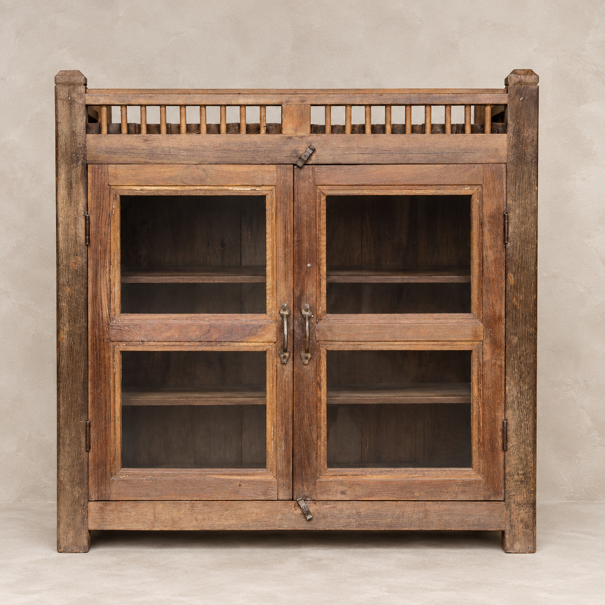 Vintage wooden glass cabinet from India with double doors and internal shelves, ideal for home storage and displaying ceramics and collected objects, exclusive to Brookfield Gardens.