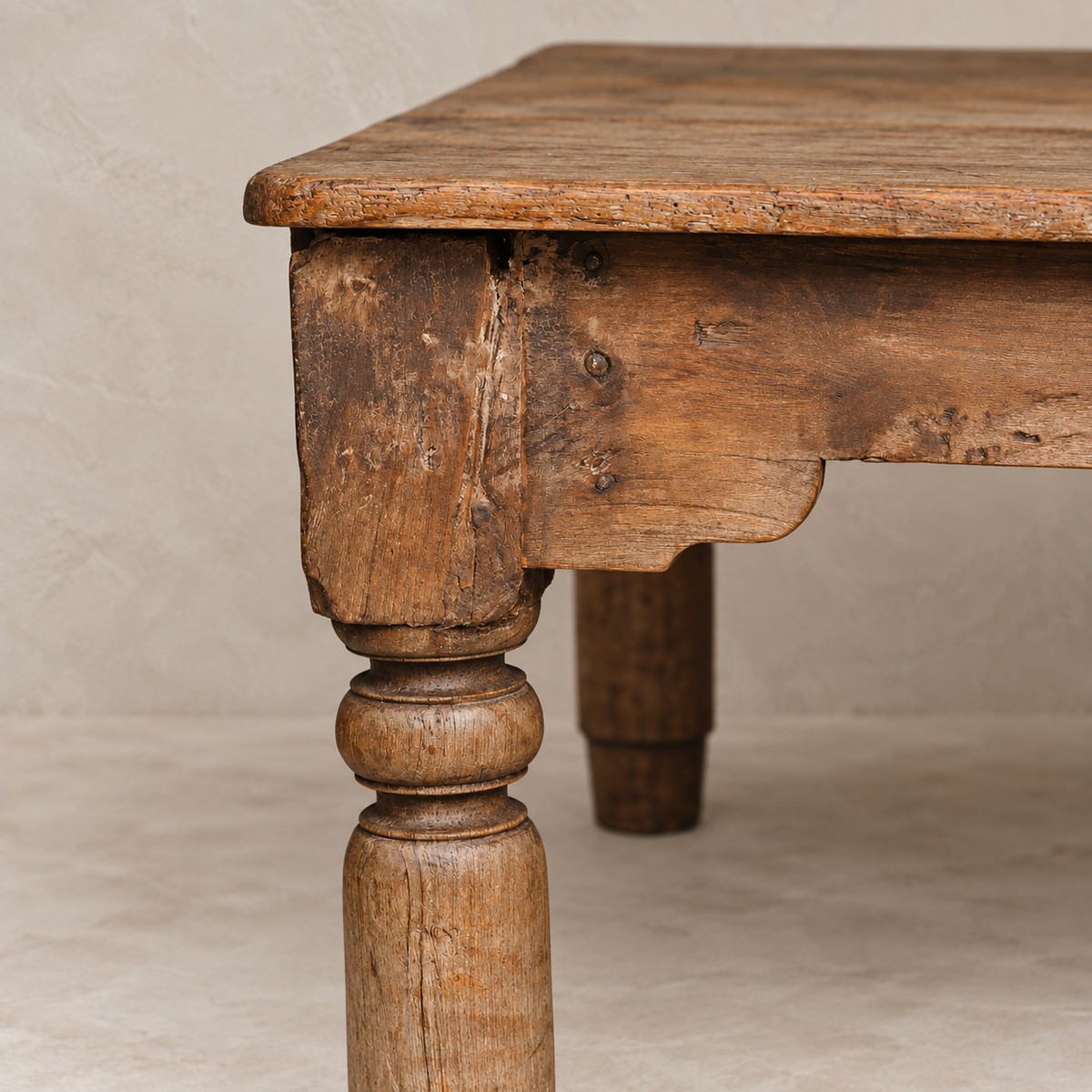 Large vintage wooden coffee table from India with turned legs and aged natural timber, ideal for living rooms and relaxed home interiors, exclusive to Brookfield Gardens.