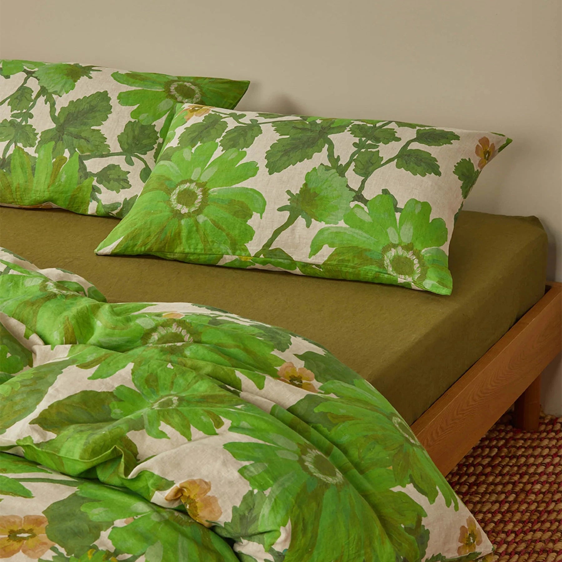 Bonnie & Neil Marigold Leaf Linen Standard Pillowcases in stonewashed French flax linen with hand-drawn botanical leaf print