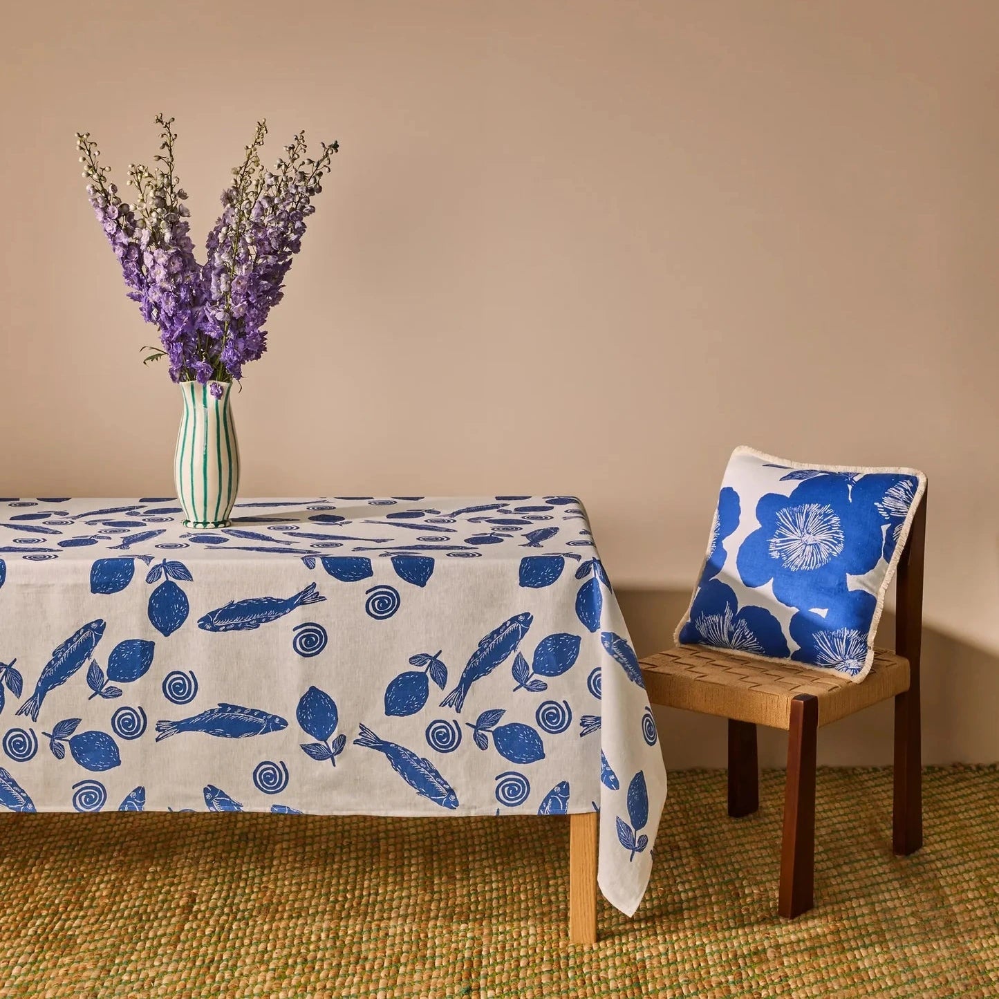 Bonnie & Neil Sardines Blue French flax linen tablecloth measuring 250 x 170cm with hand-painted sardine design on natural oat linen.