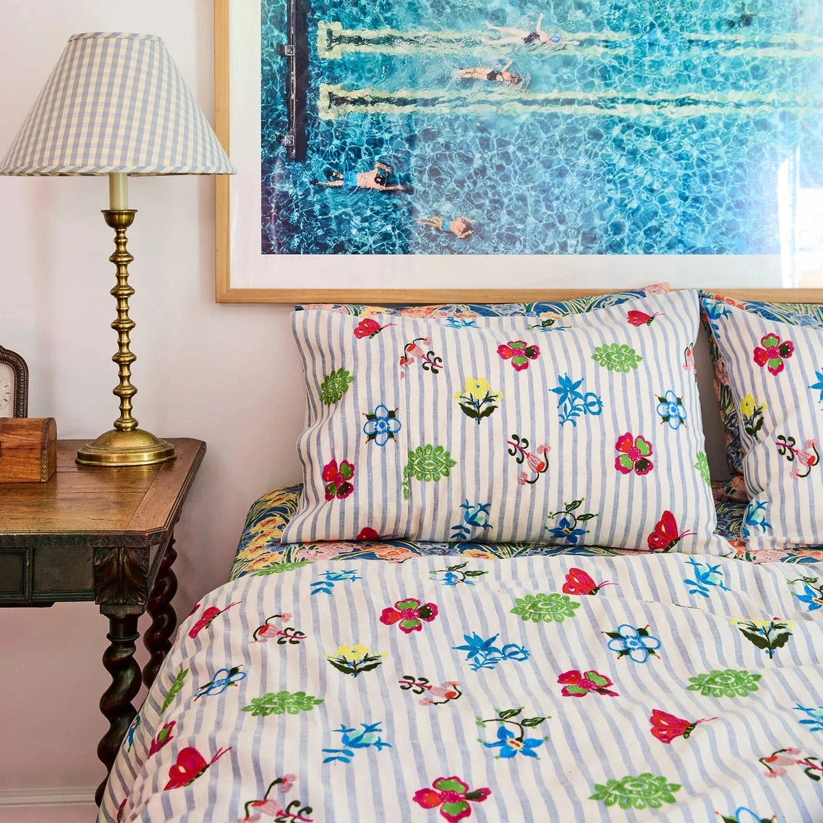 Kip & Co x Anna Spiro Malabar Floral Embroidered Linen Pillowcases in Forever Floral Butter, featuring decorative floral embroidery on soft linen.