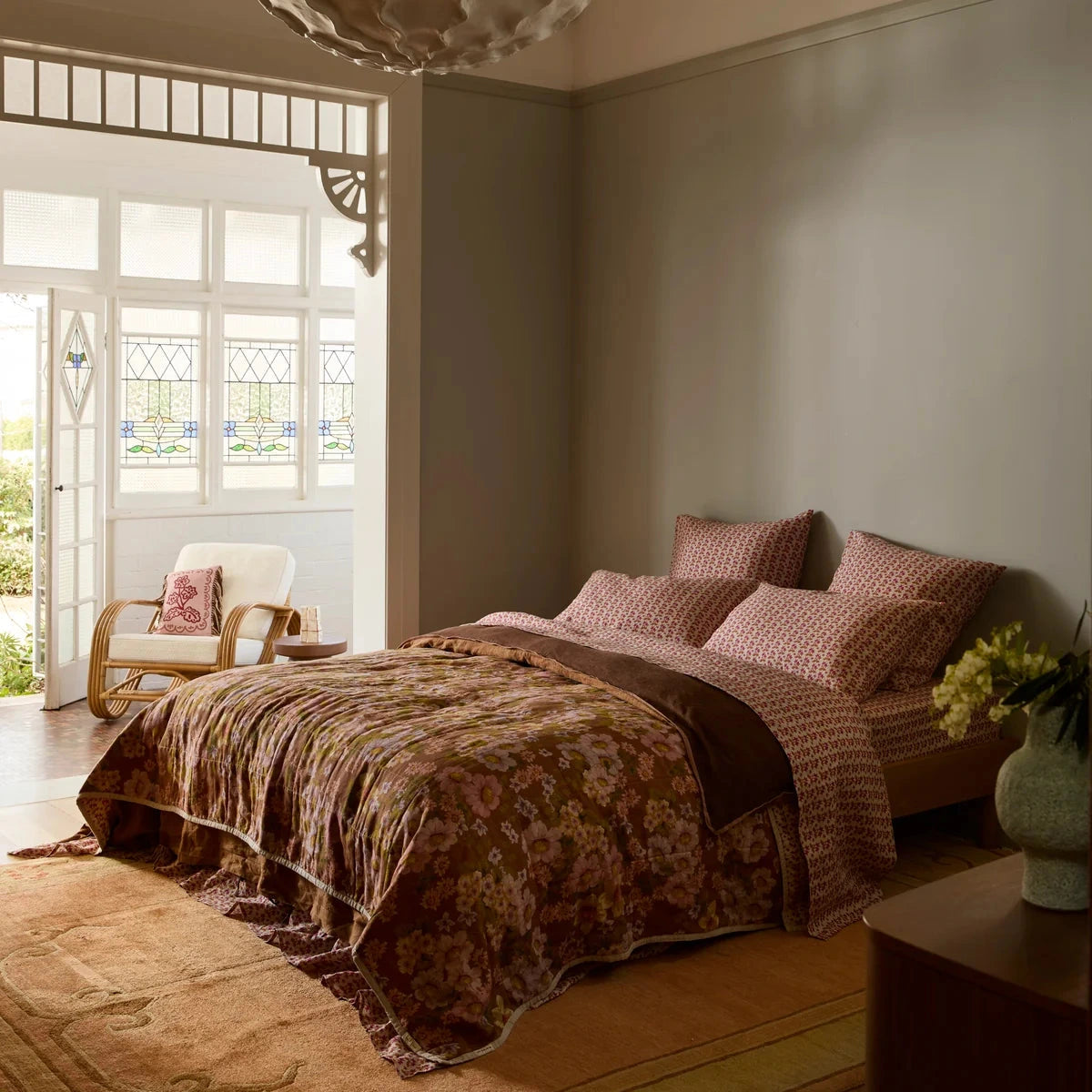 Bonnie & Neil Buttercup Rust & Petit Madeline Pink reversible linen quilted throw featuring warm rust florals and delicate pink botanical patterns.
