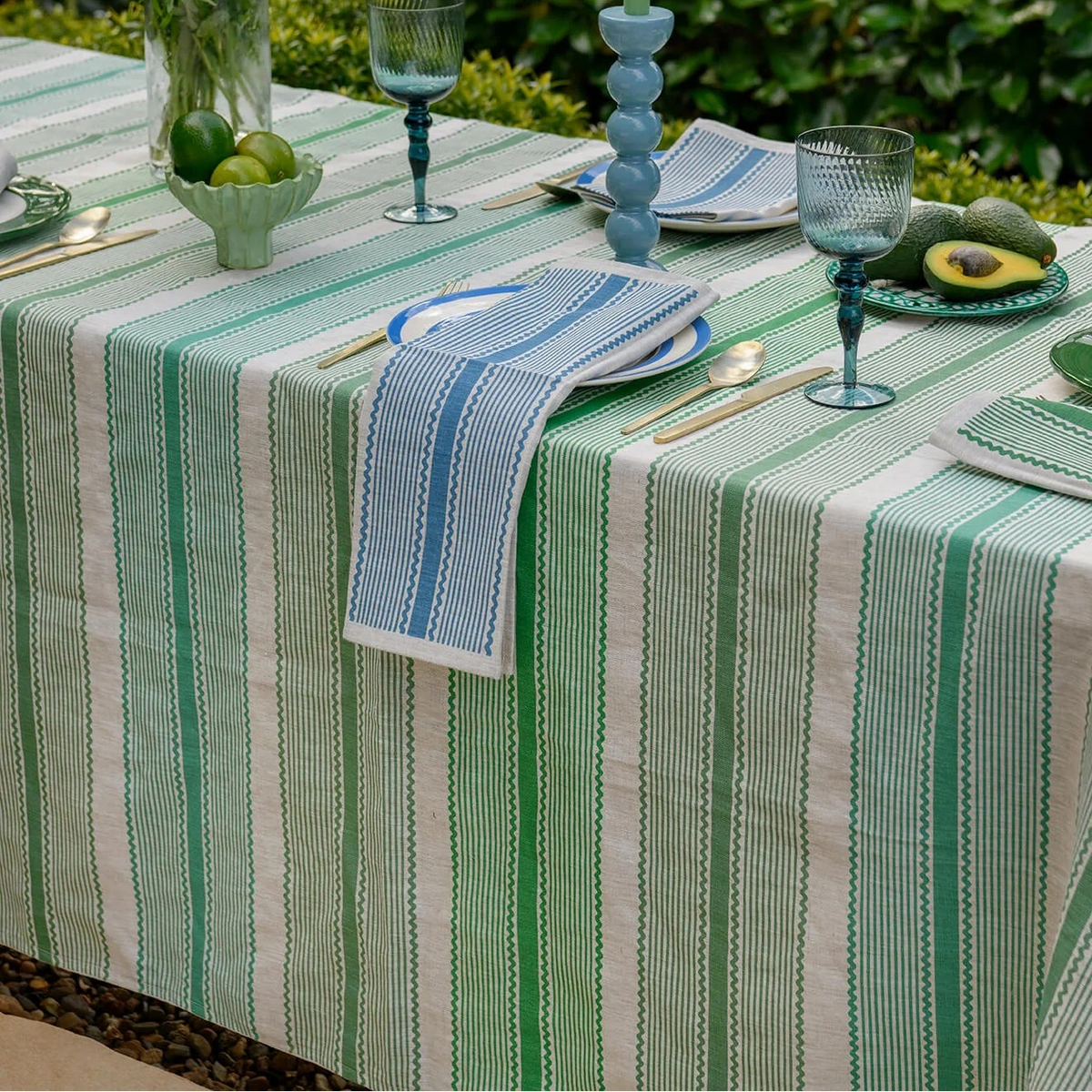 Aqua Door Designs Green Tuxedo Stripe linen tablecloth featuring glass green, grass green and bayleaf green stripes on natural linen.