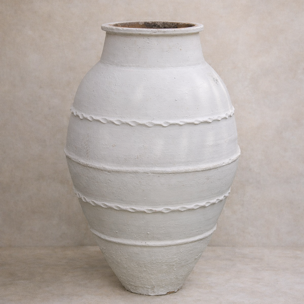 Large Turkish Odemis terracotta pot with classic rounded form and weathered finish, styled for architectural garden spaces.