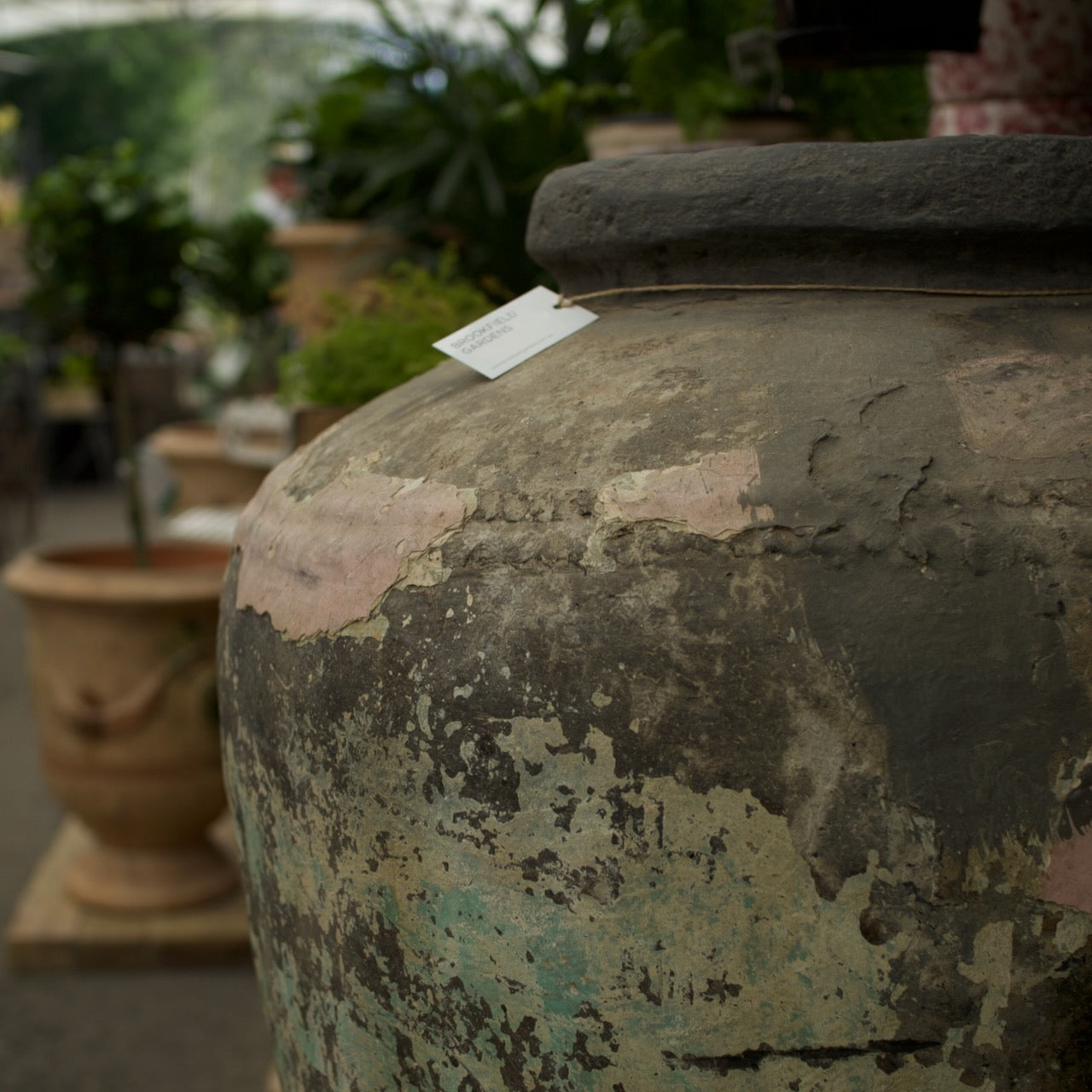 Large vintage Indian terracotta urn with naturally weathered patina, perfect as a statement garden planter or decorative outdoor vessel.
